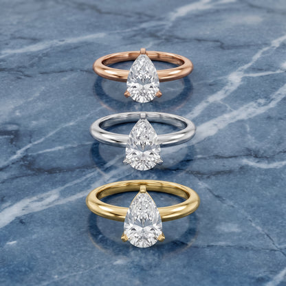 Amira Six-Prong Solitaire Pear Diamond Engagement Ring in Yellow Gold - 3rings.jpg