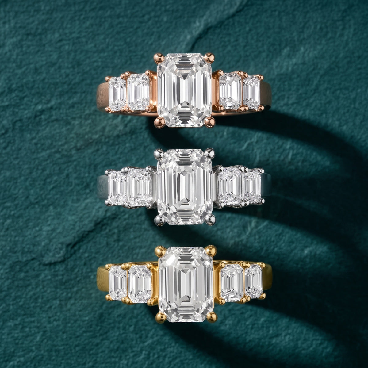 Amber Graduated Five-Stone Emerald Diamond Engagement Ring in White Gold - 3rings.jpg