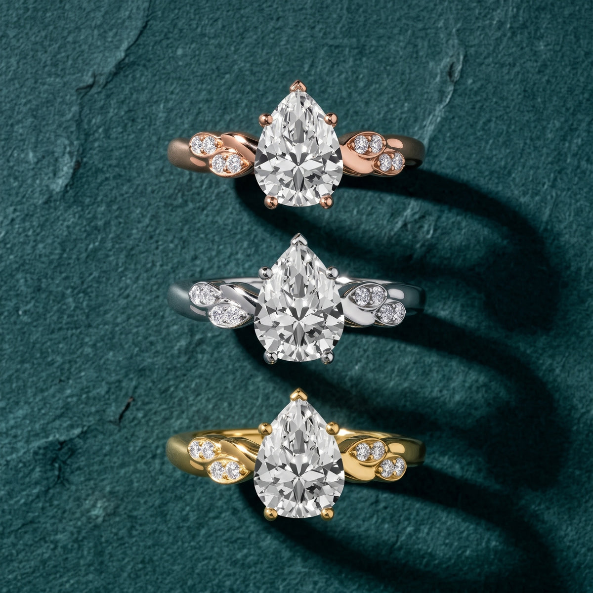 Robin Leaf Twist Pear Diamond Engagement Ring in White Gold - 3rings.jpg