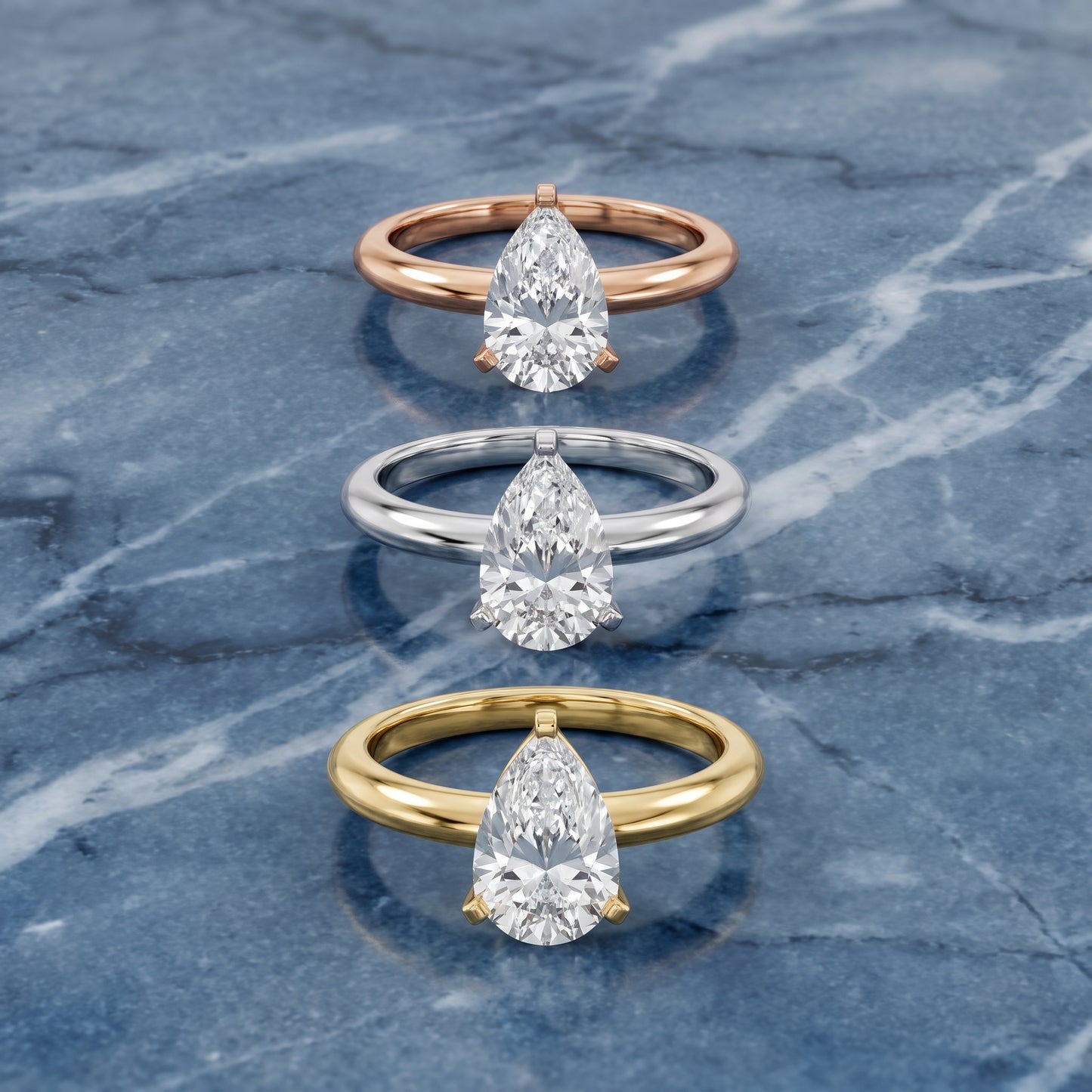 Amira Six-Prong Solitaire Pear Diamond Engagement Ring in Silver - 3rings.jpg