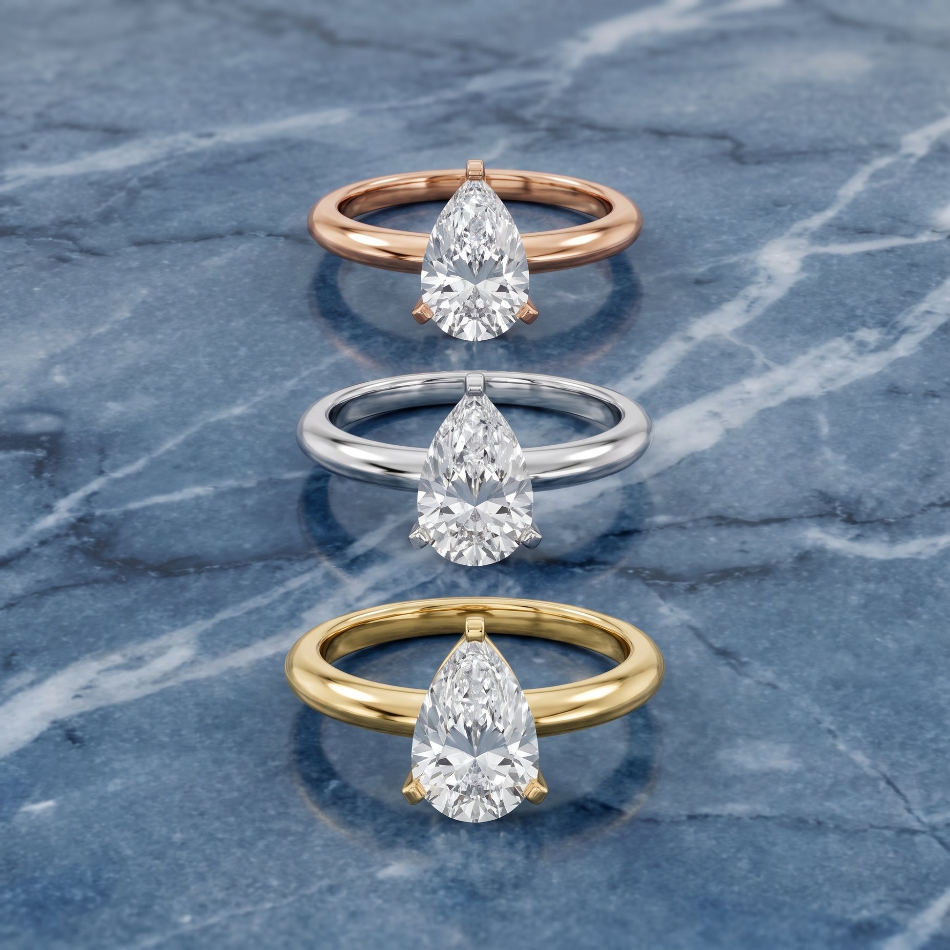Amira Six-Prong Solitaire Pear Diamond Engagement Ring in Silver - 3rings.jpg