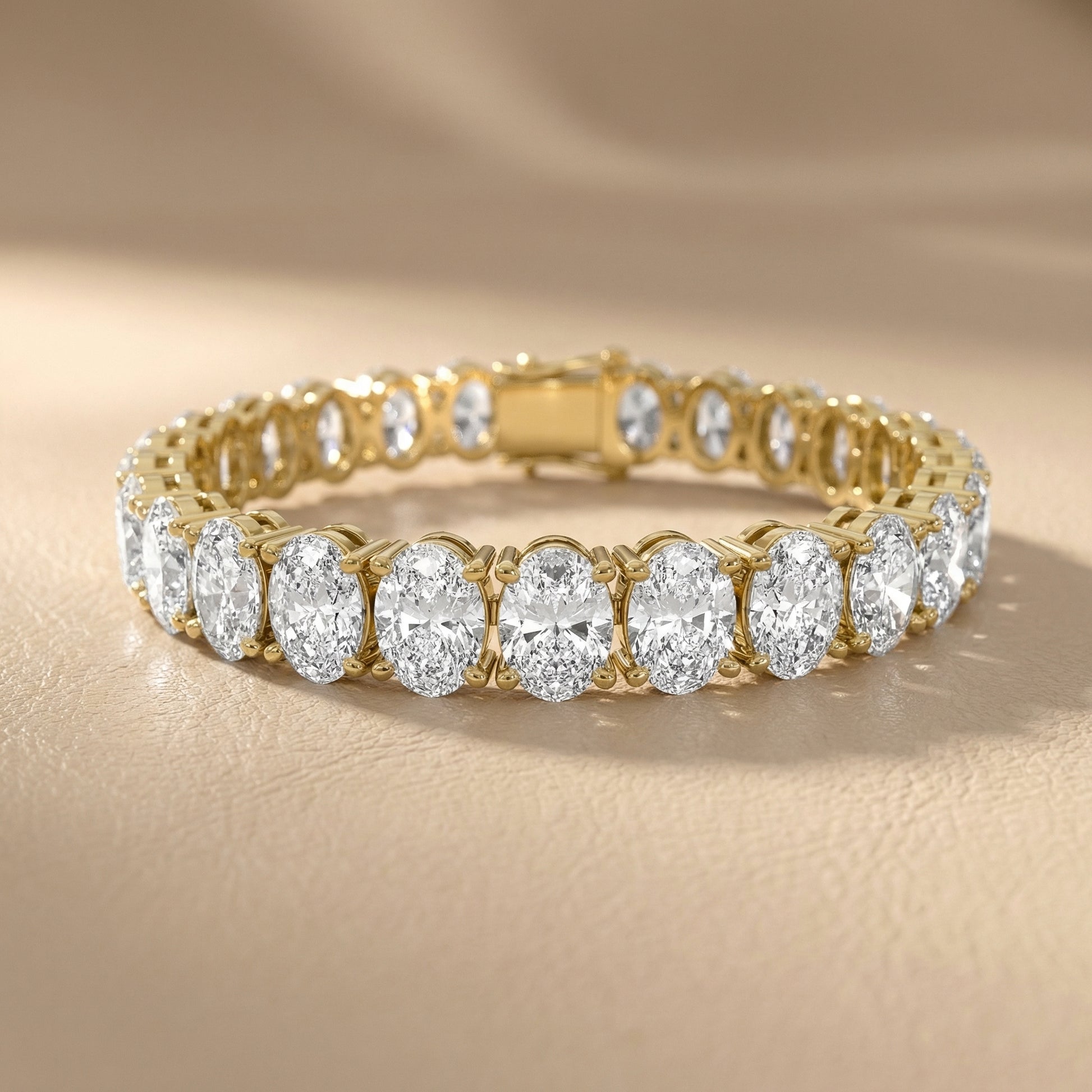 Oval Cut Lab Grown Diamond Tennis Bracelet in Yellow Gold