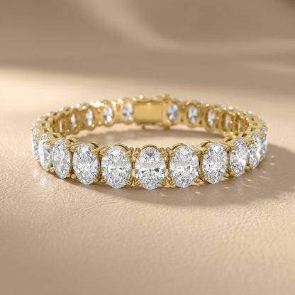 Oval Cut Lab Grown Diamond Tennis Bracelet in Yellow Gold