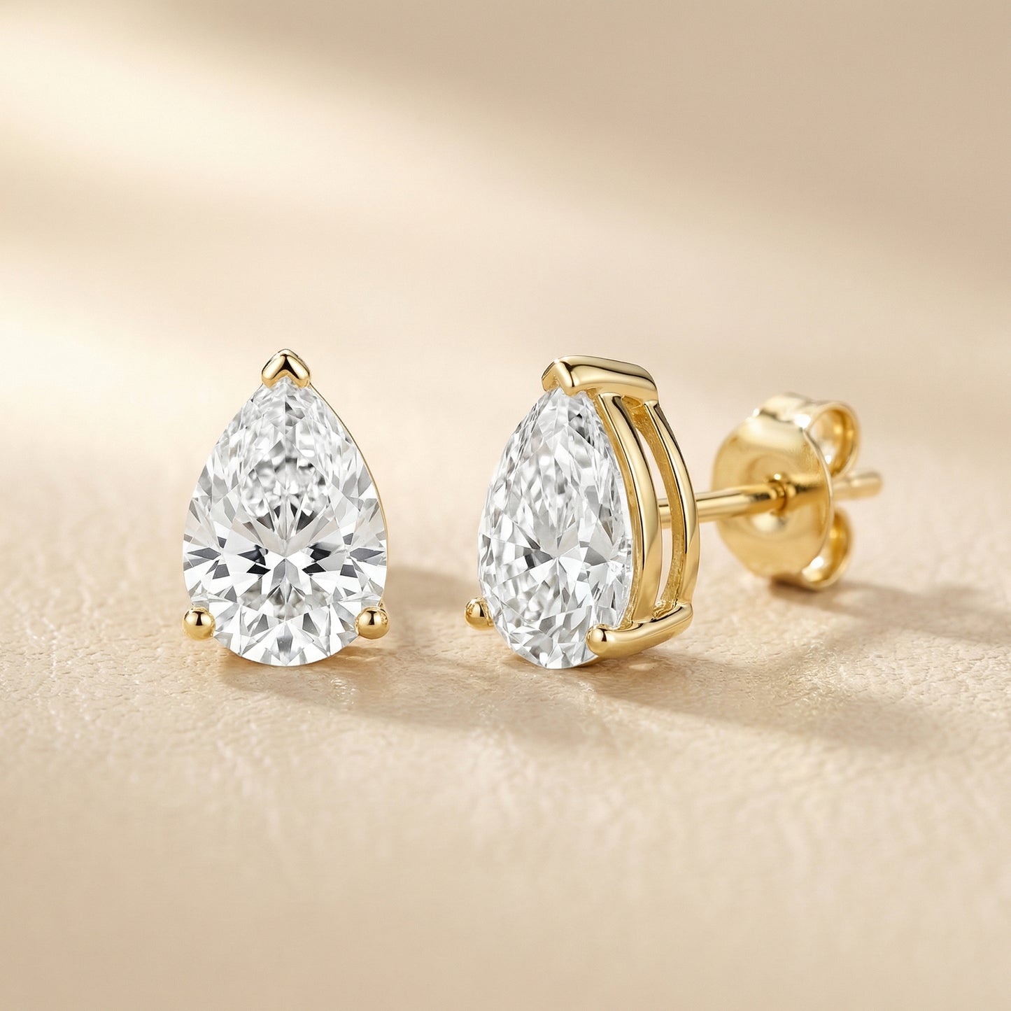 Three Prong Pear Diamond Stud Earrings in Yellow Gold