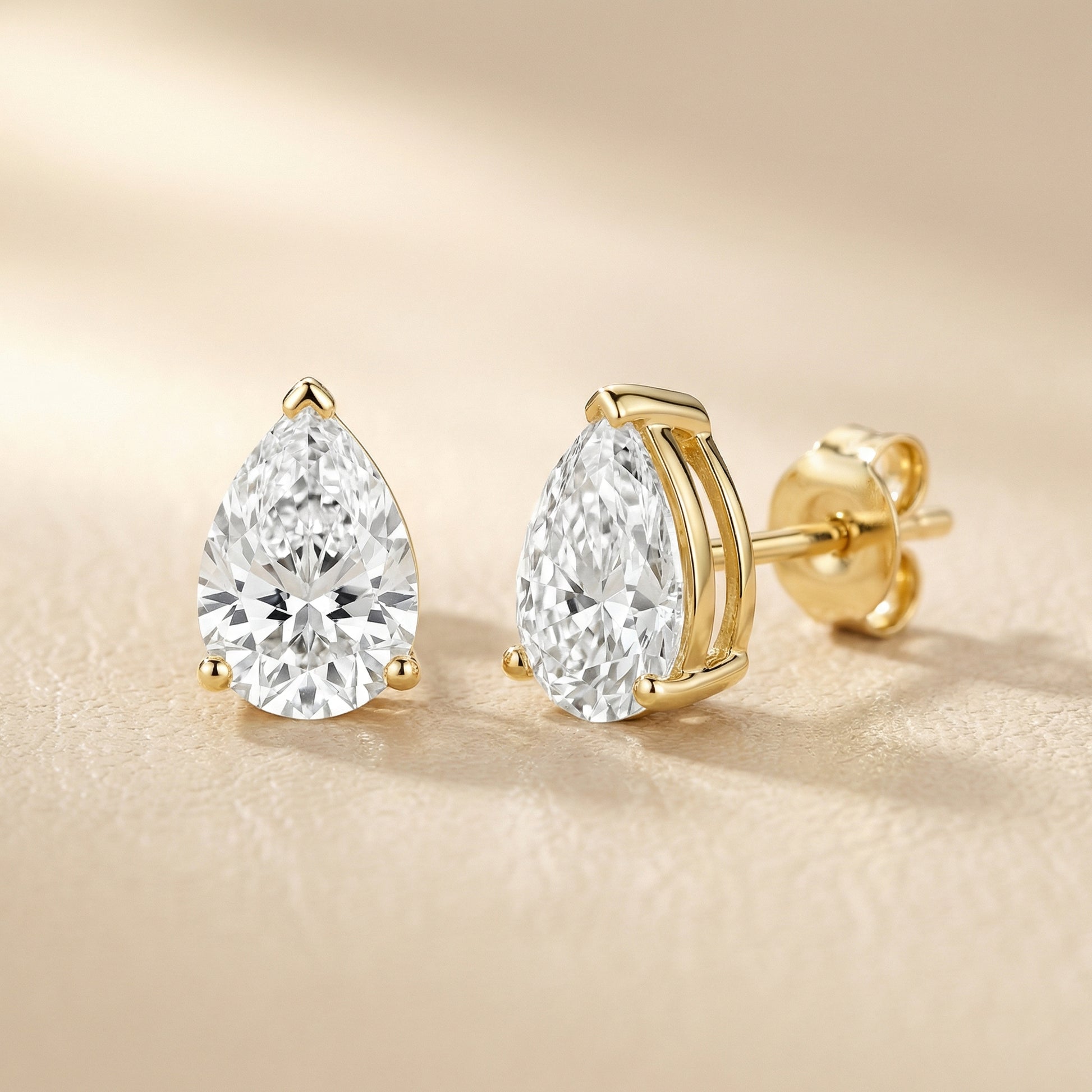 Three Prong Pear Diamond Stud Earrings in Yellow Gold