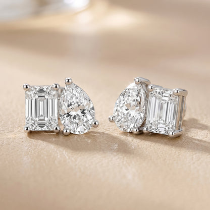 Emerald Pear Cut Lab Grown Diamond Toi Et Moi Earrings in Platinum