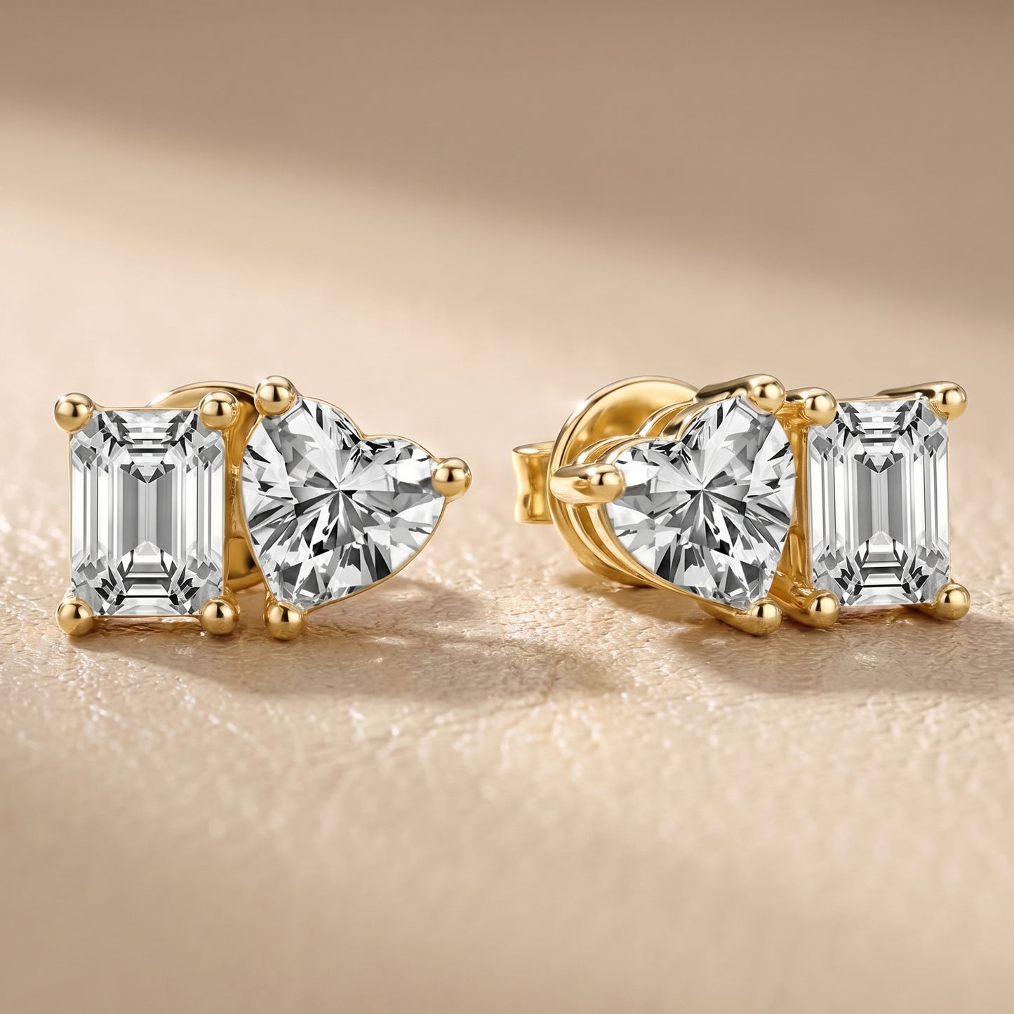 Emerald Heart Cut Lab Grown Diamond Toi Et Moi Stud Earrings in Yellow Gold