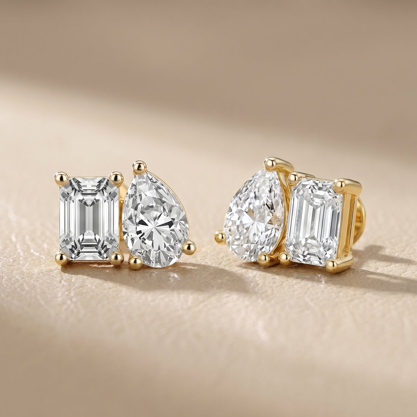 Emerald Pear Cut Lab Grown Diamond Toi Et Moi Earrings in Yellow Gold