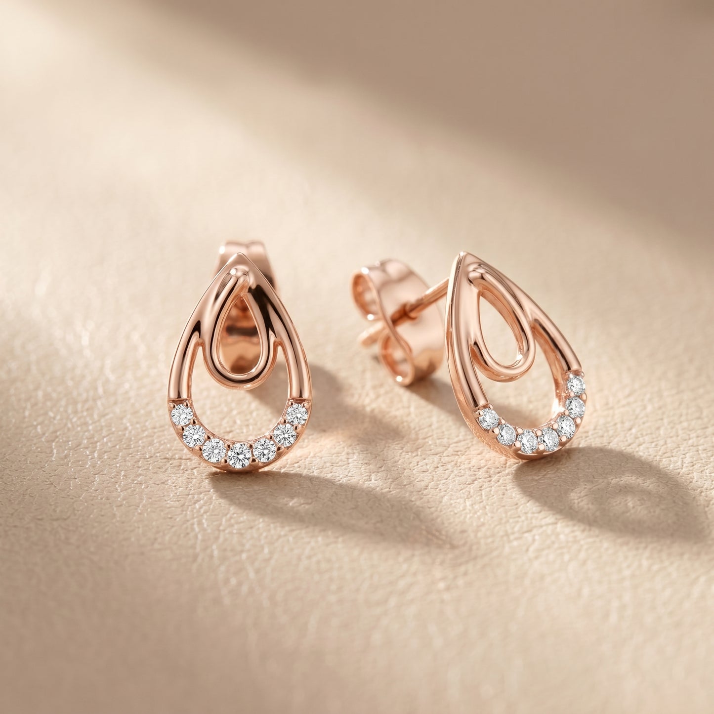 Round Cut Lab Grown Diamond Drop Earrings in Rose Gold