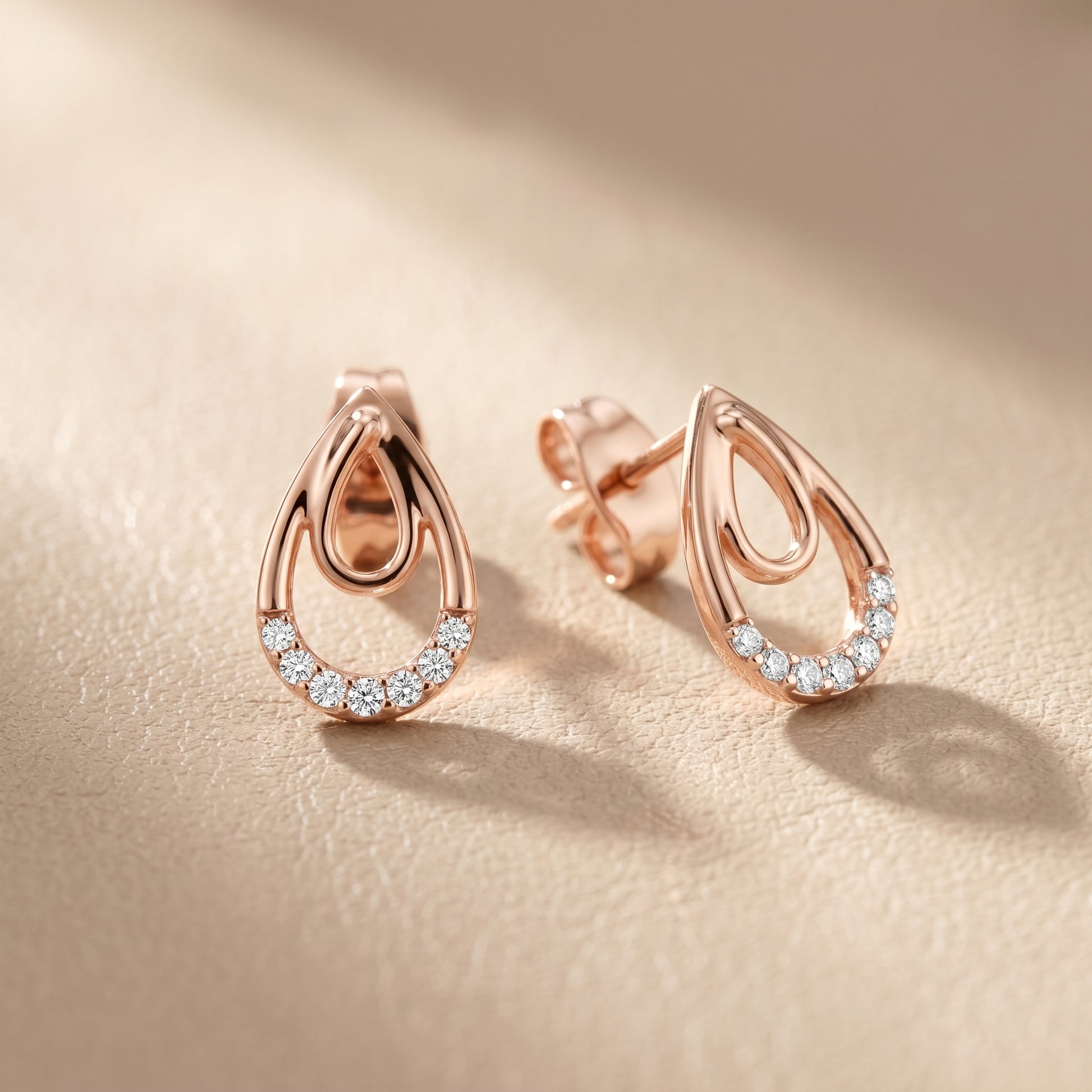 Round Cut Lab Grown Diamond Drop Earrings in Rose Gold
