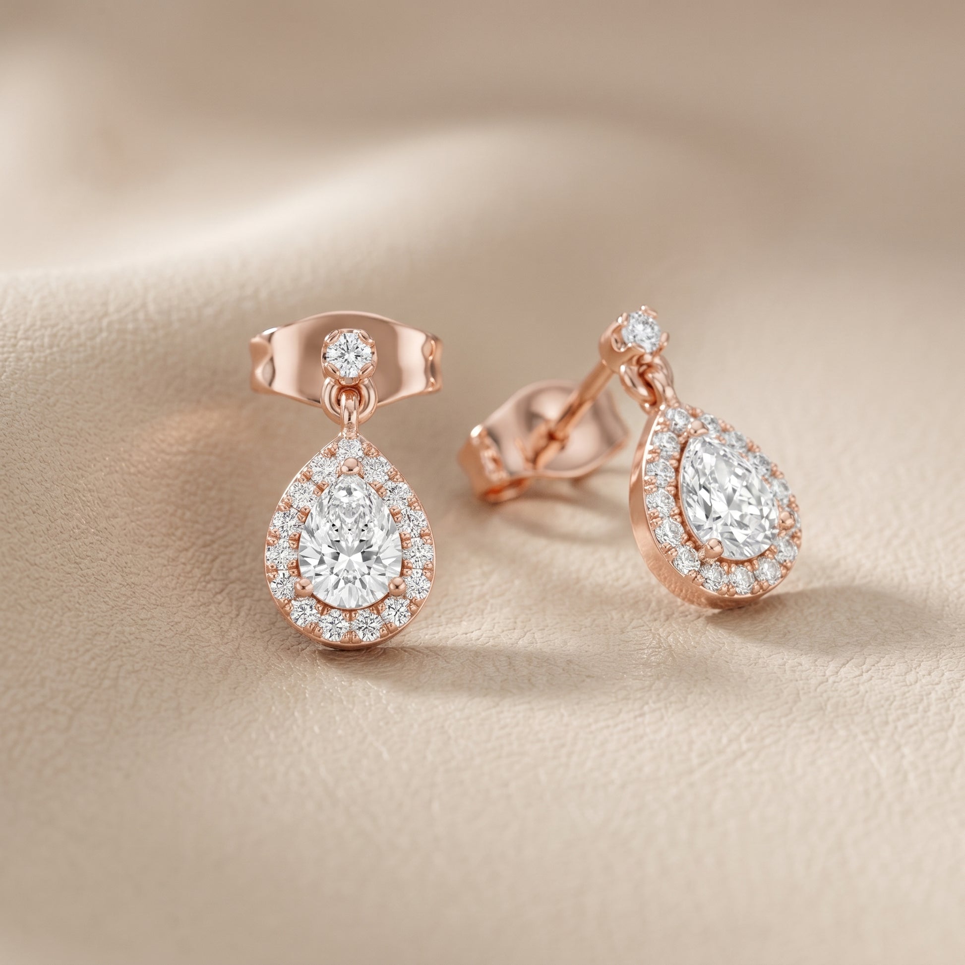 Pear Round Cut Lab Grown Diamond Stud Earrings in Rose Gold