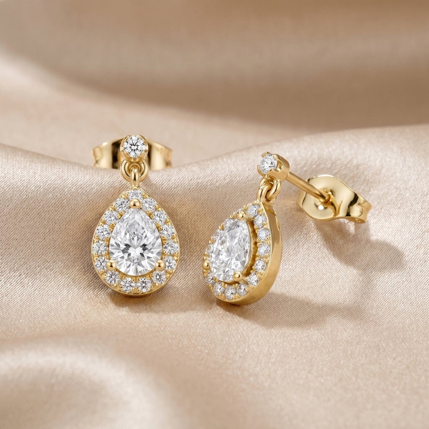 Pear Round Cut Lab Grown Diamond Stud Earrings in Yellow Gold