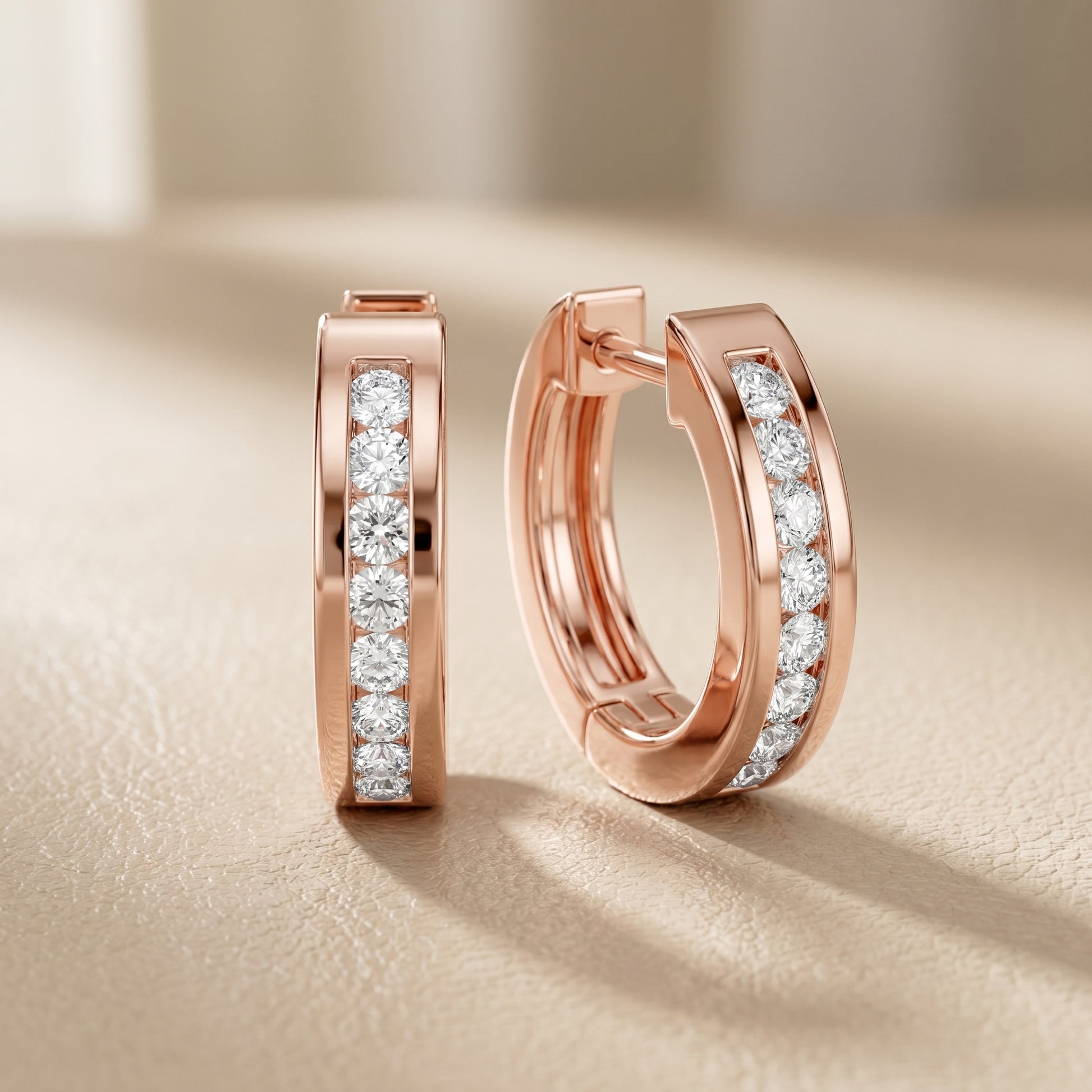 Round Cut Lab Grown Diamond Crest Channel Huggie Hoop Earrings in Rose Gold
