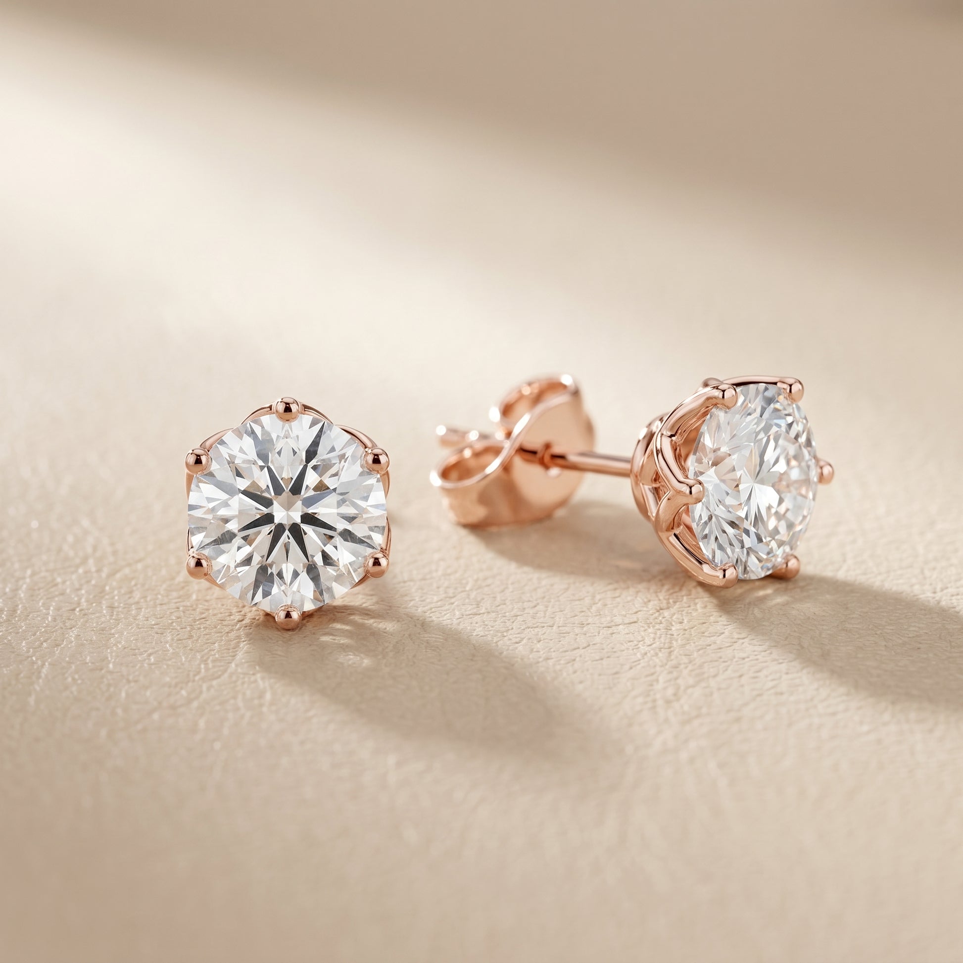 Round Cut Lab Grown Diamond Stud Earrings in Rose Gold