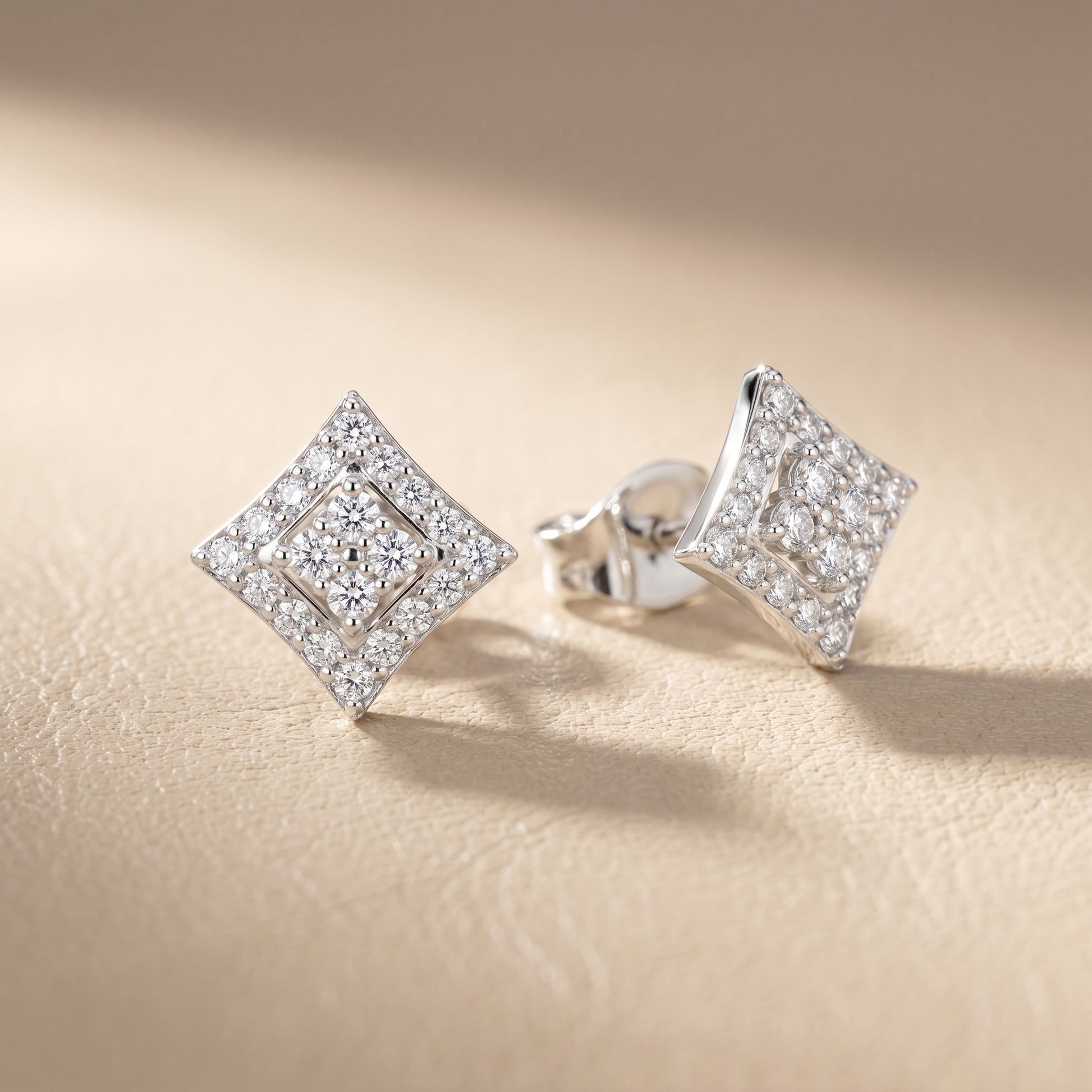 Round Cut Lab Grown Diamond Stud Earrings in White Gold