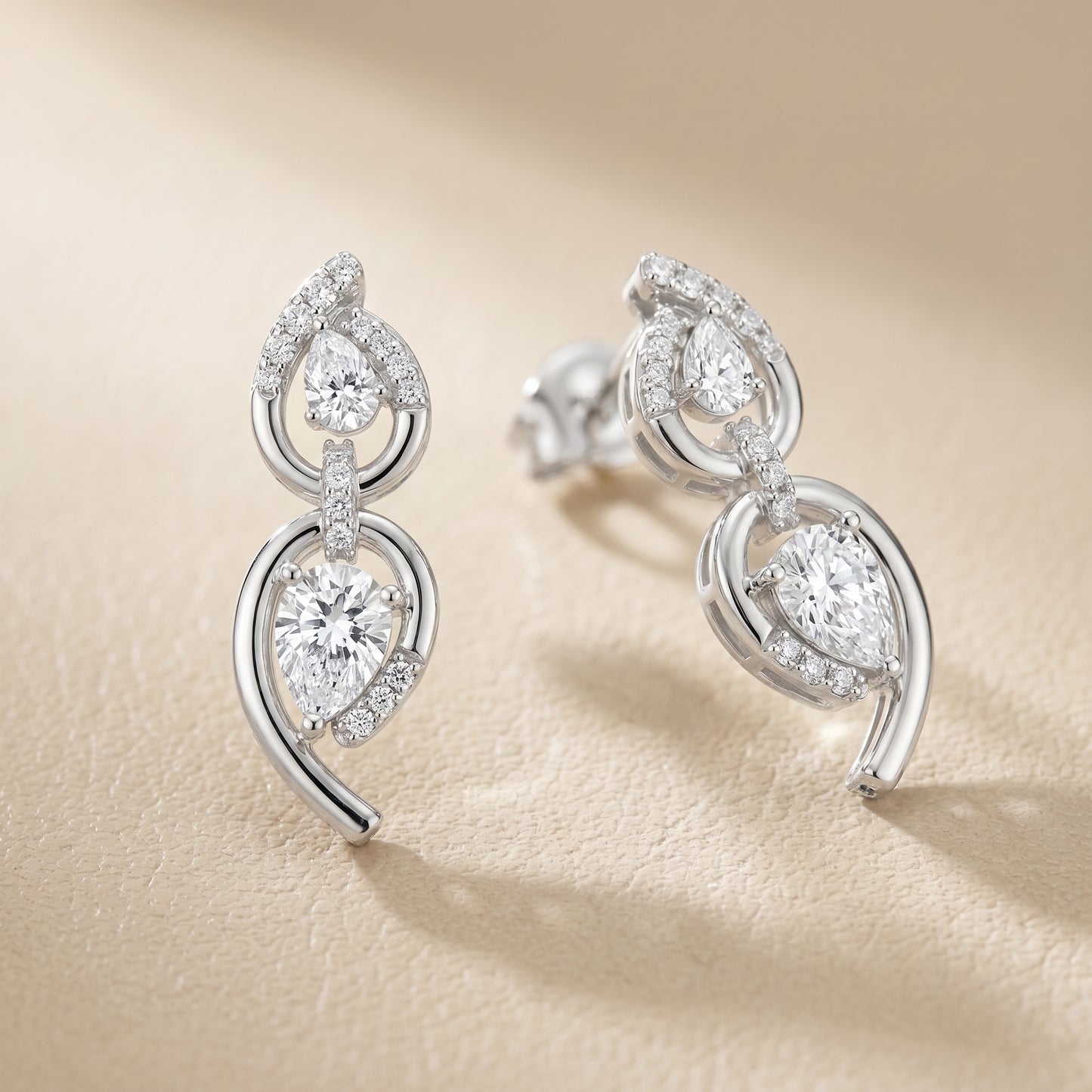 Pear Round Cut Lab Grown Diamond Stud Earrings in White Gold