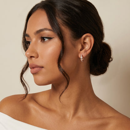 Round Cut Lab Grown Diamond Huggie Hoop Earrings in Rose Gold