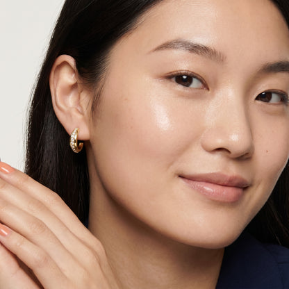 Round Cut Lab Grown Diamond Huggie Hoop Earrings in Yellow Gold