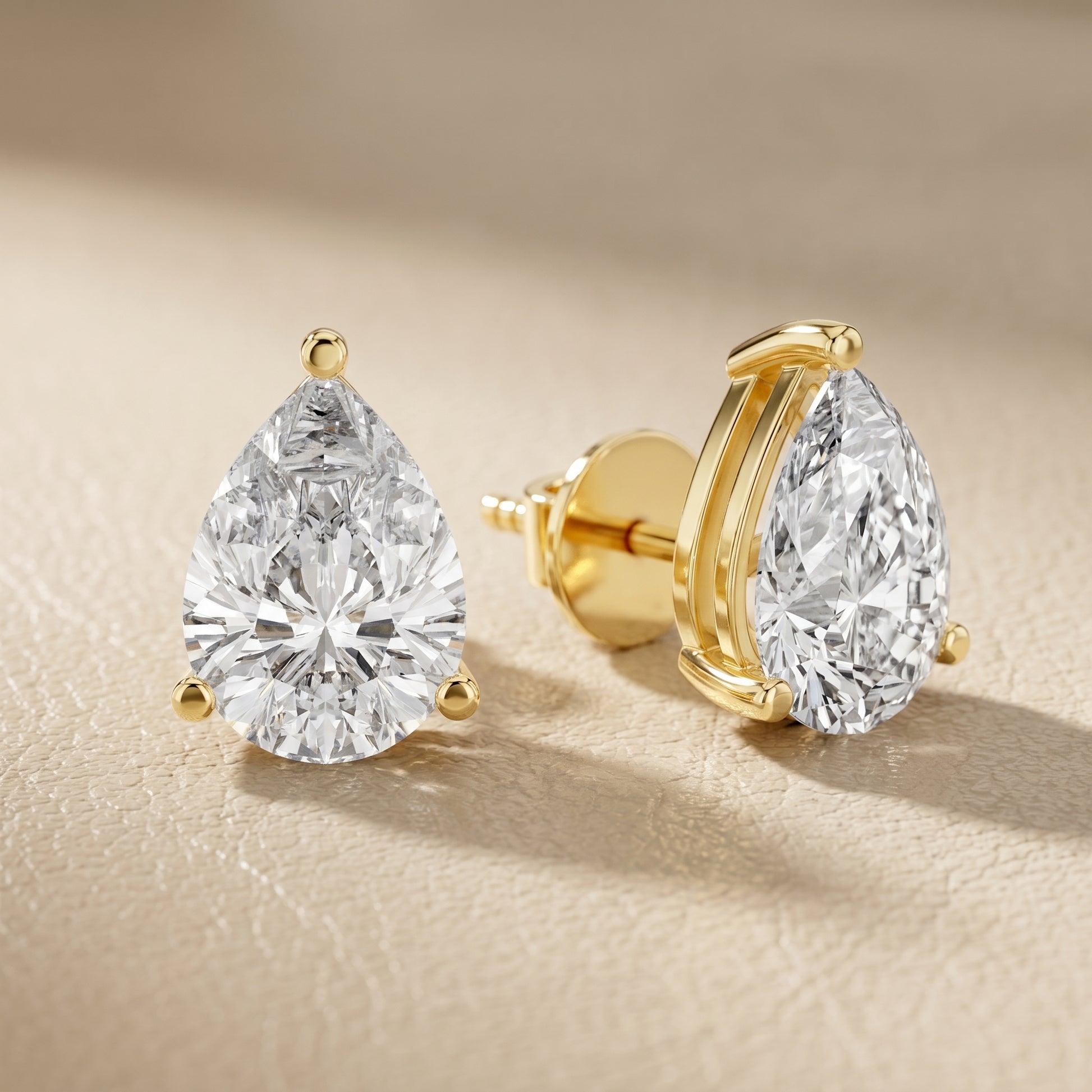 Pear Cut Lab Grown Diamond Stud Earrings in Yellow Gold
