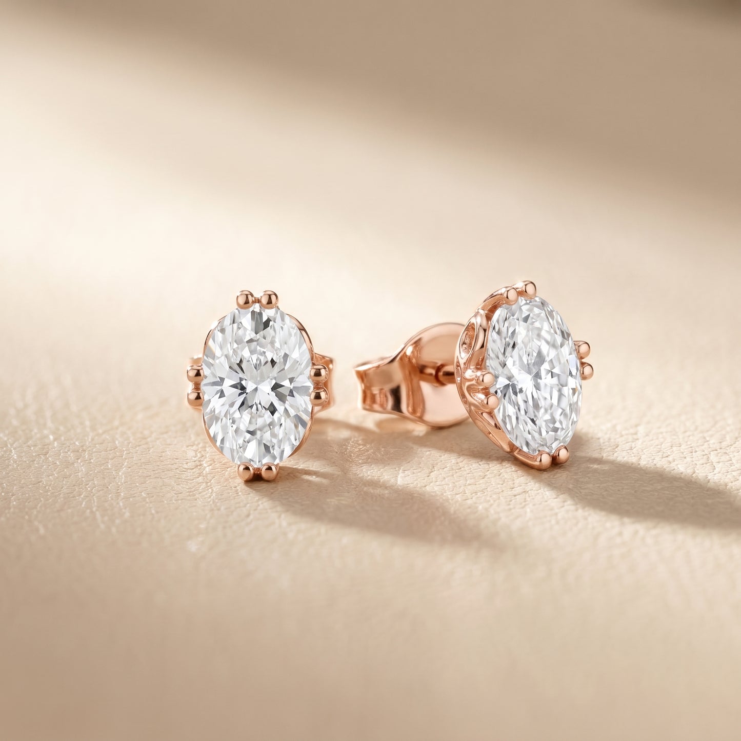 Oval Cut Lab Grown Diamond Stud Earrings in Rose Gold