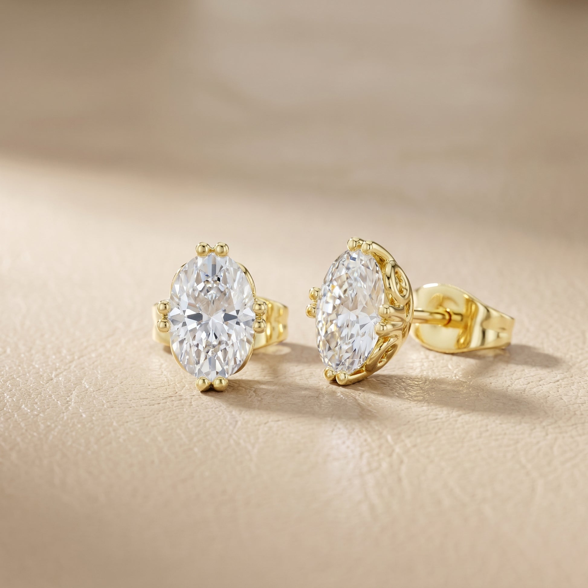 Oval Cut Lab Grown Diamond Stud Earrings in Yellow Gold