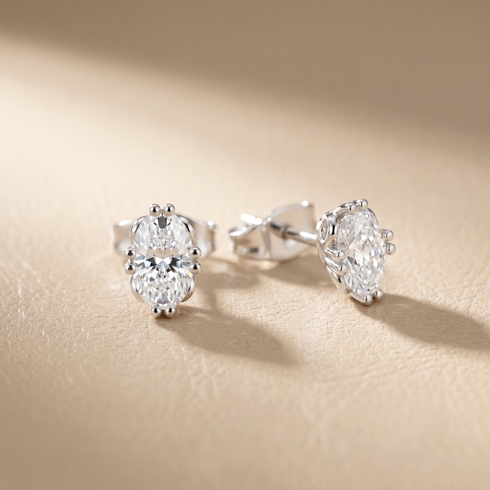 Oval Cut Lab Grown Diamond Stud Earrings in Silver