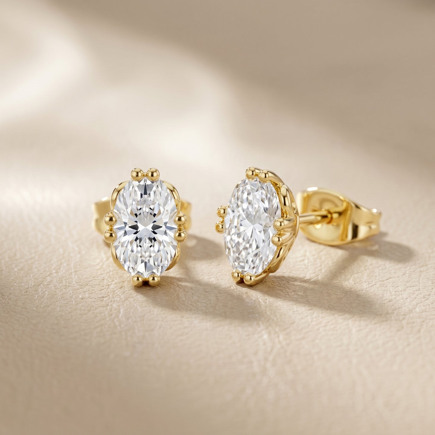 Oval Cut Lab Grown Diamond Stud Earrings in Yellow Gold