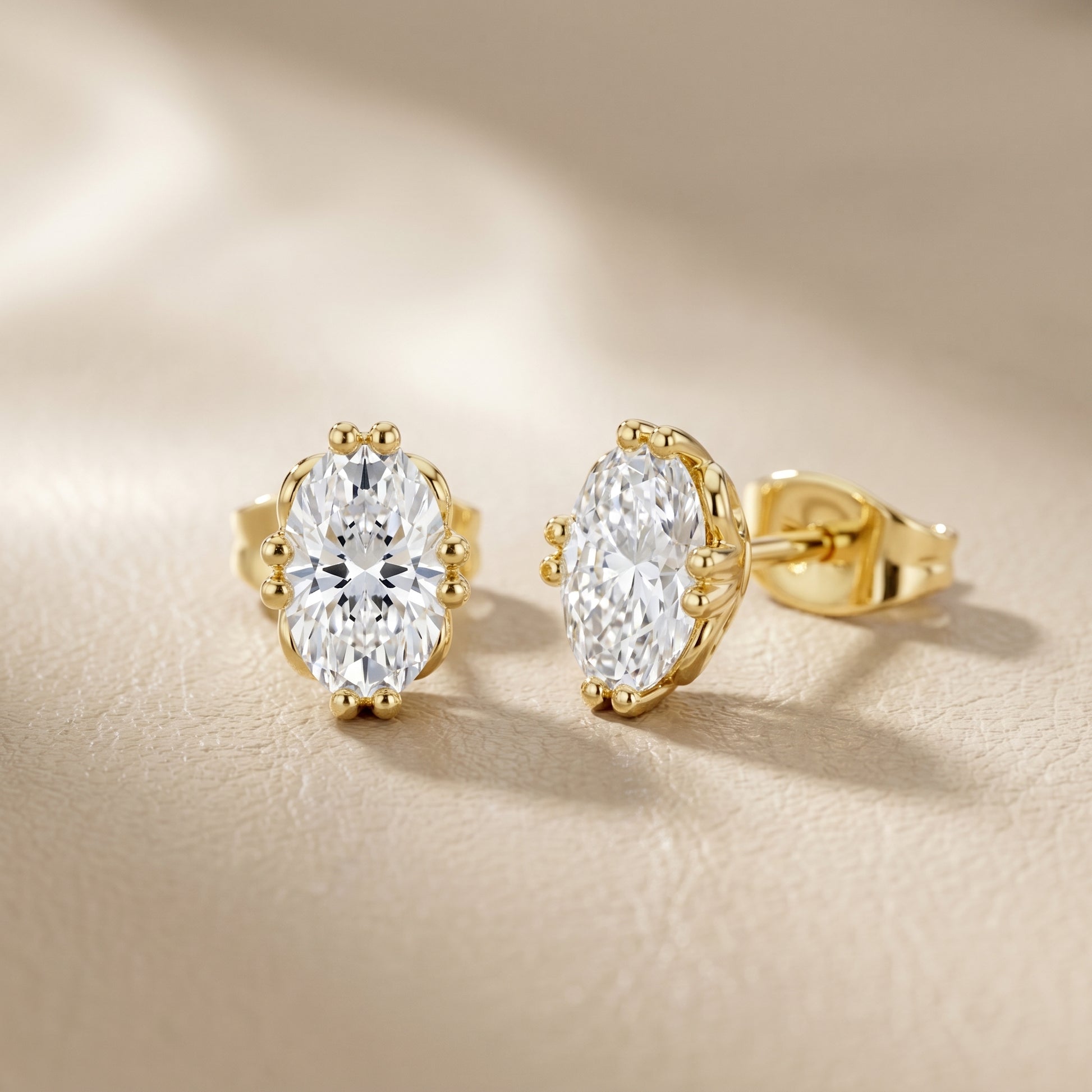Oval Cut Lab Grown Diamond Stud Earrings in Yellow Gold