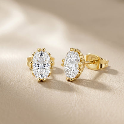 Oval Cut Lab Grown Diamond Stud Earrings in Yellow Gold