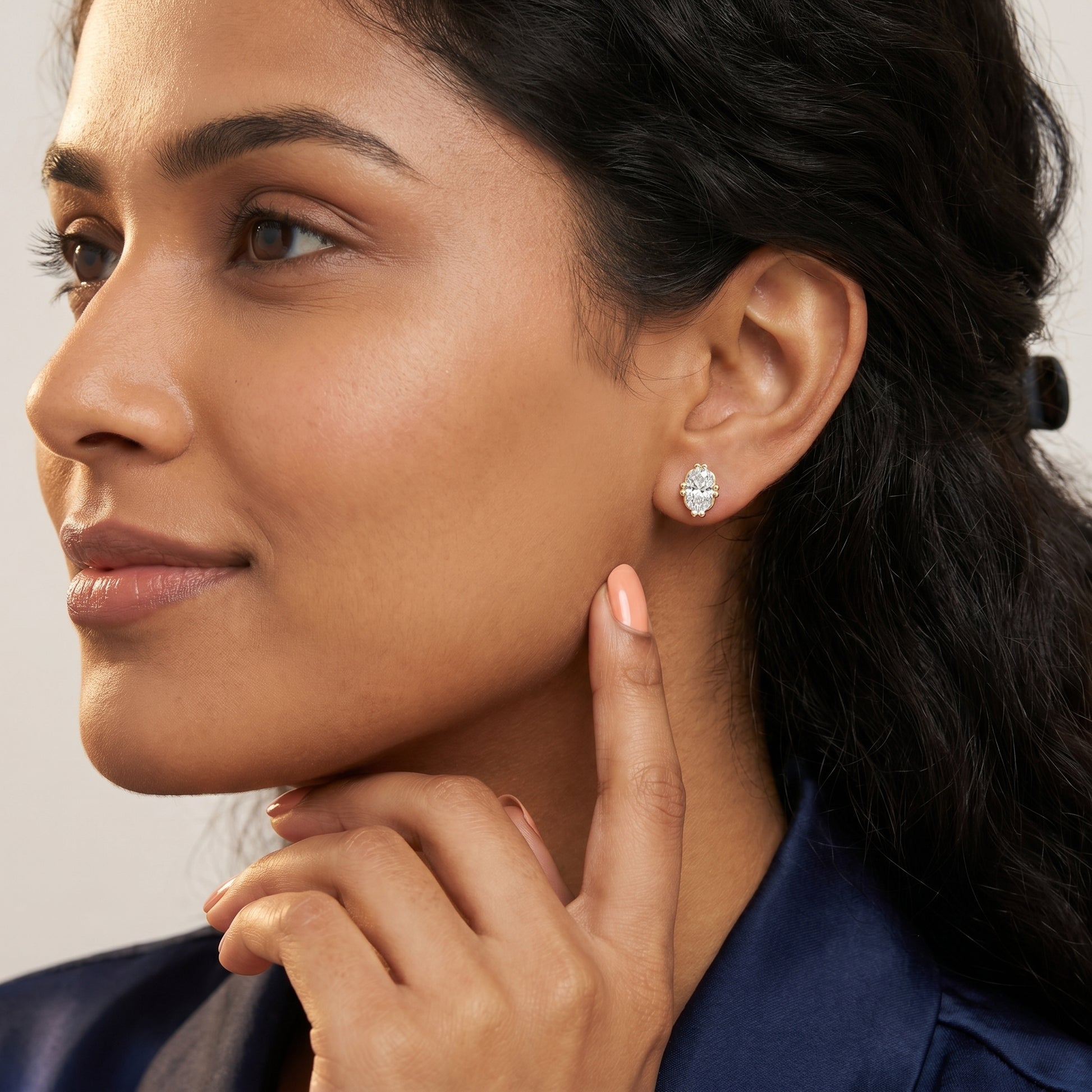 Oval Cut Lab Grown Diamond Stud Earrings in Yellow Gold