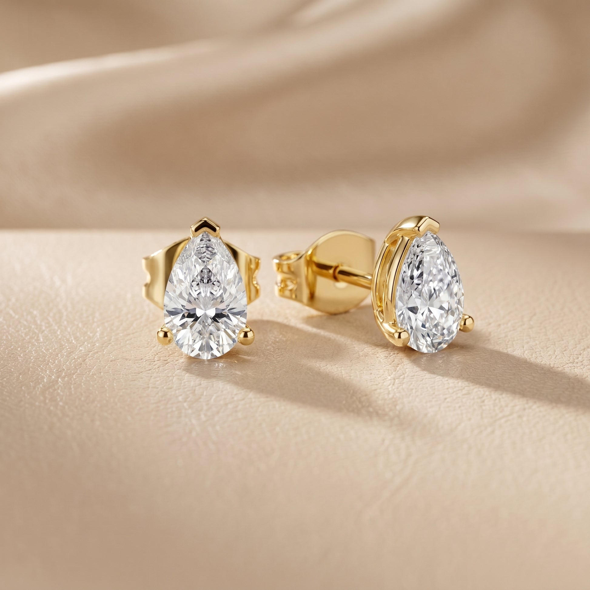 Pear Cut Lab Grown Diamond Stud Earrings in Yellow Gold