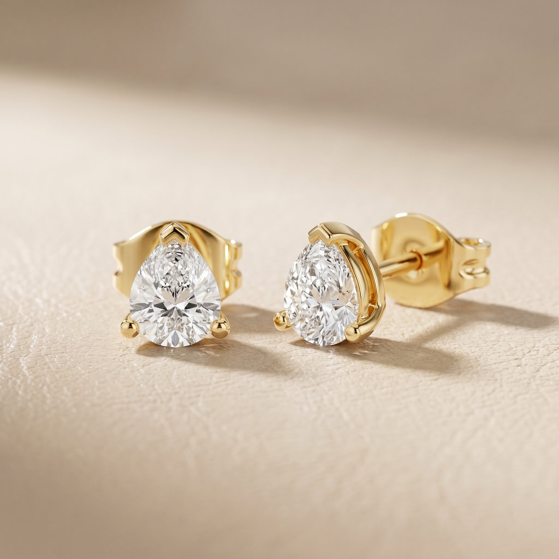 Pear Cut Lab Grown Diamond Stud Earrings in Yellow Gold