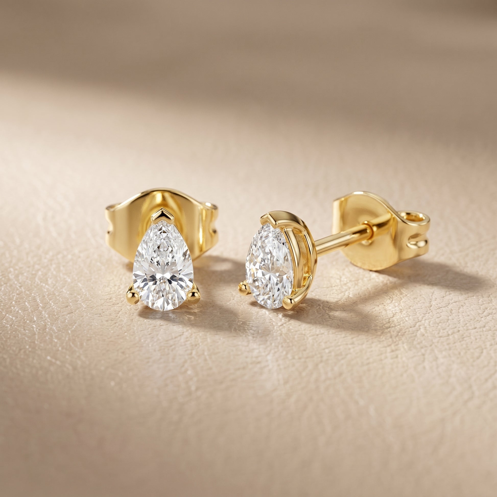 Pear Cut Lab Grown Diamond Stud Earrings in Yellow Gold