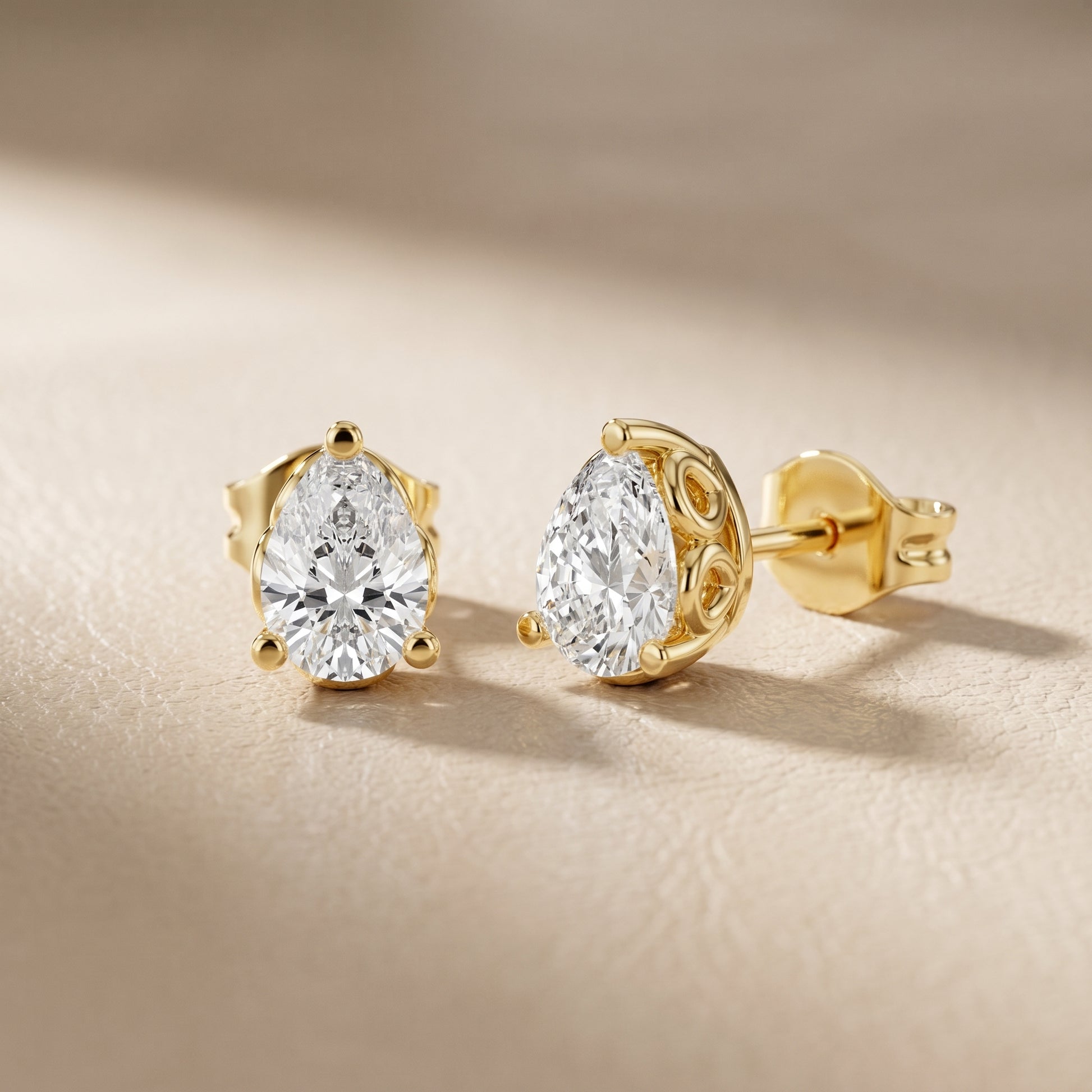 Pear Cut Lab Grown Diamond Stud Earrings in Yellow Gold