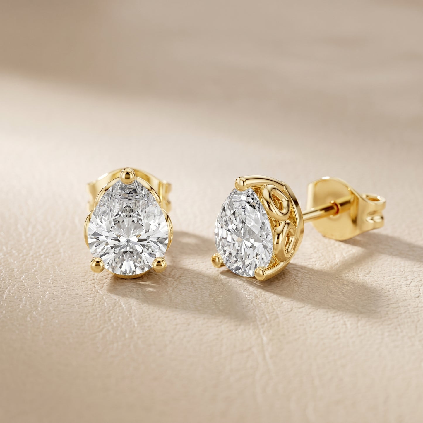 Pear Cut Lab Grown Diamond Stud Earrings in Yellow Gold