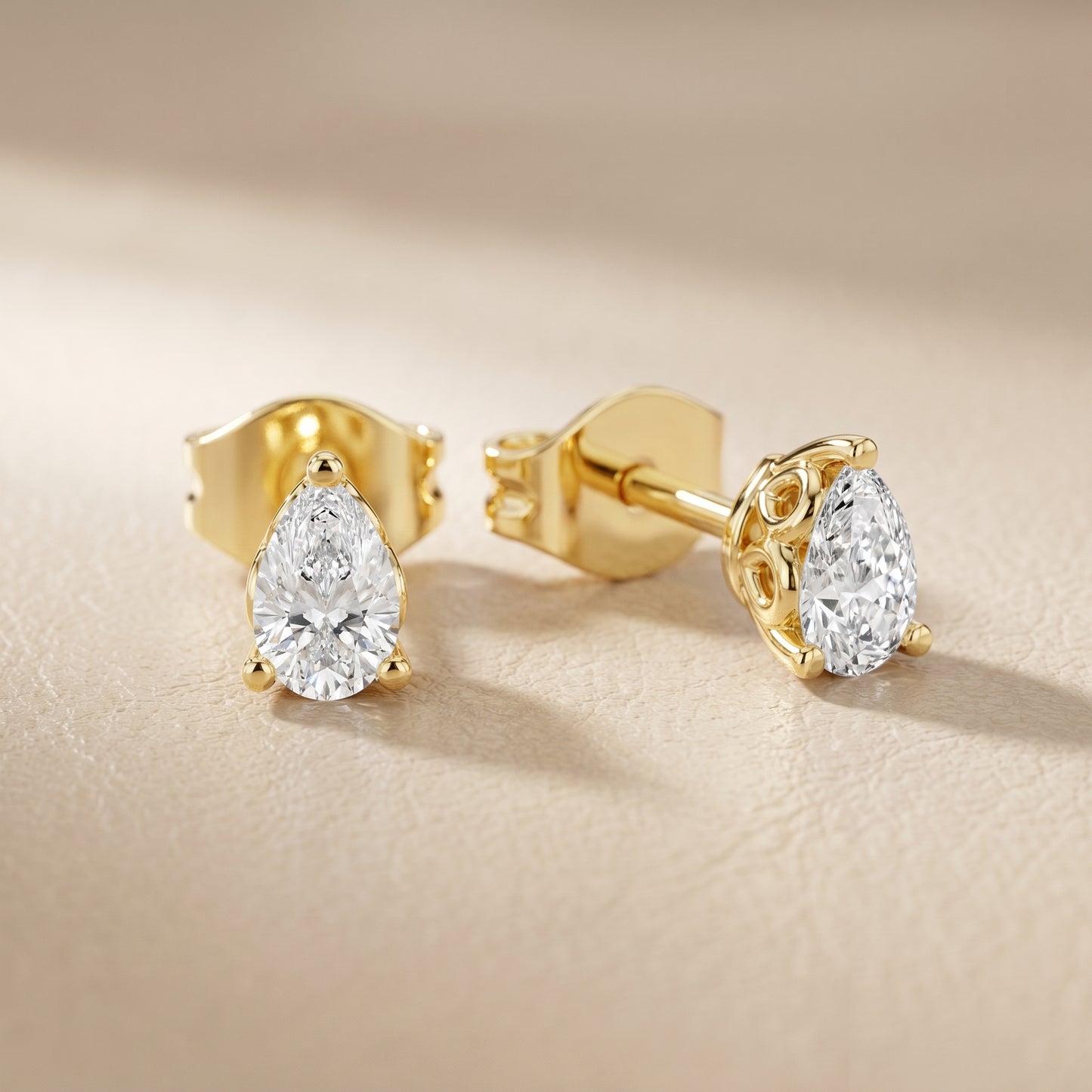 Pear Cut Lab Grown Diamond Stud Earrings in Yellow Gold