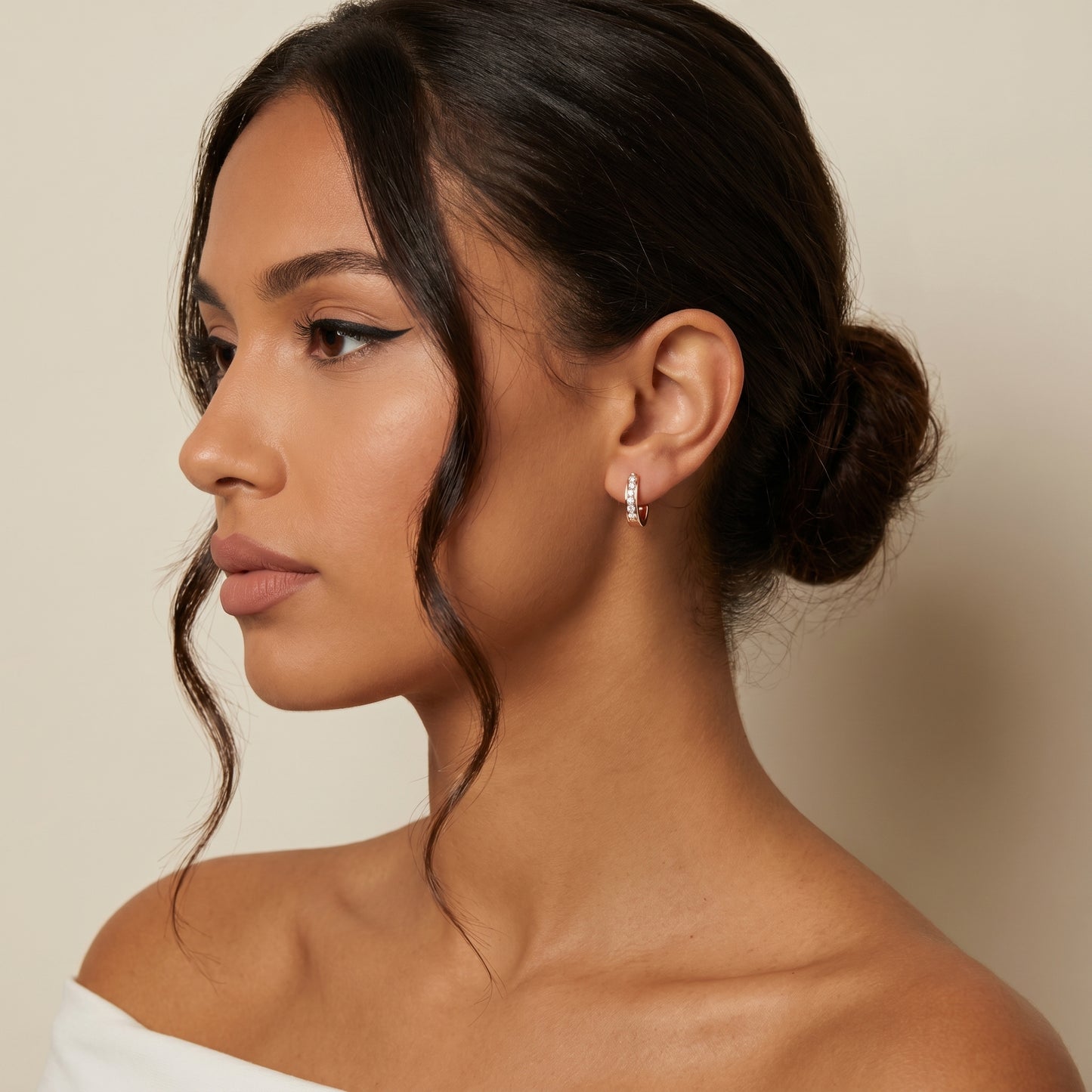 Round Cut Lab Grown Diamond Huggie Earrings in Rose Gold