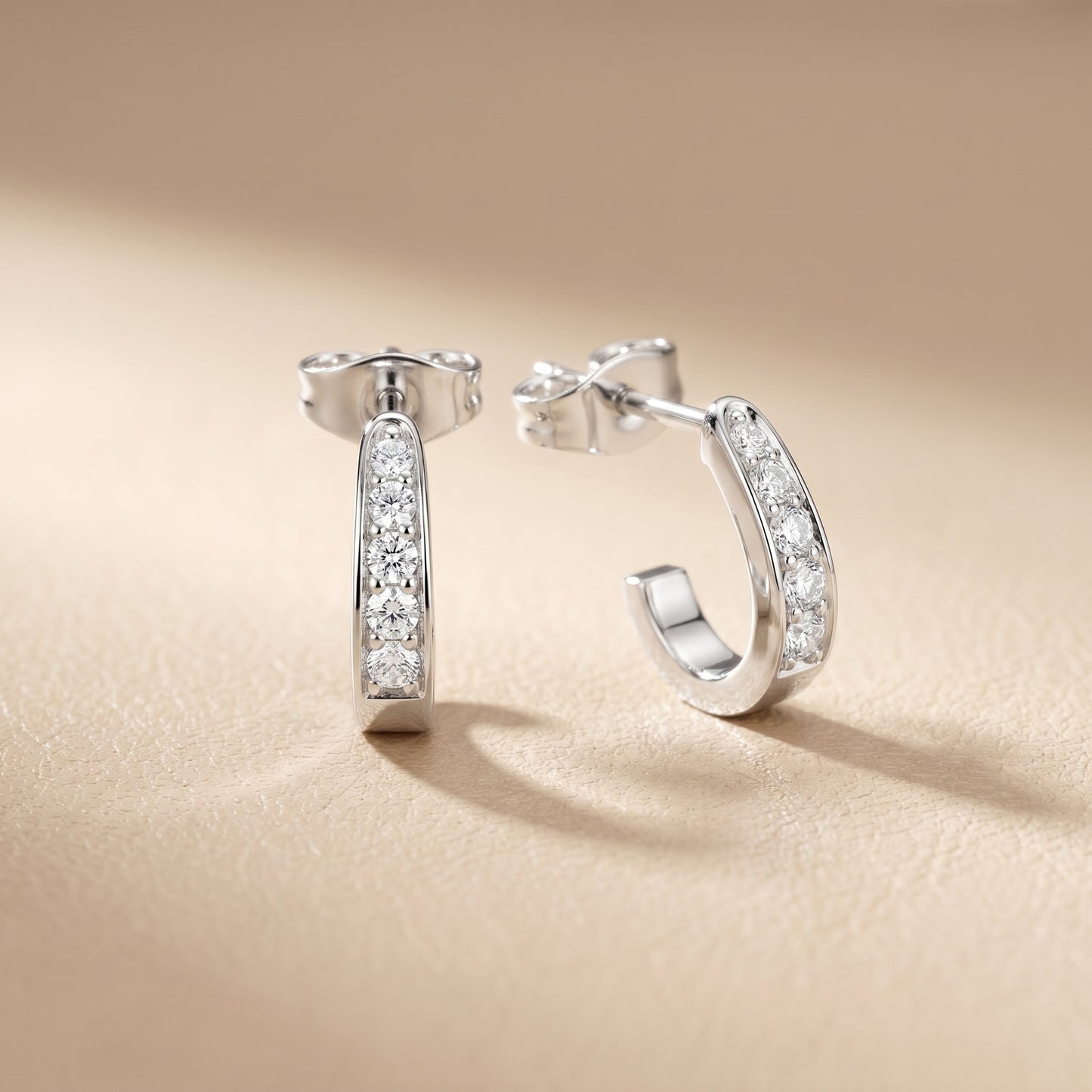 Round Cut Lab Grown Diamond Huggie Earrings in Platinum