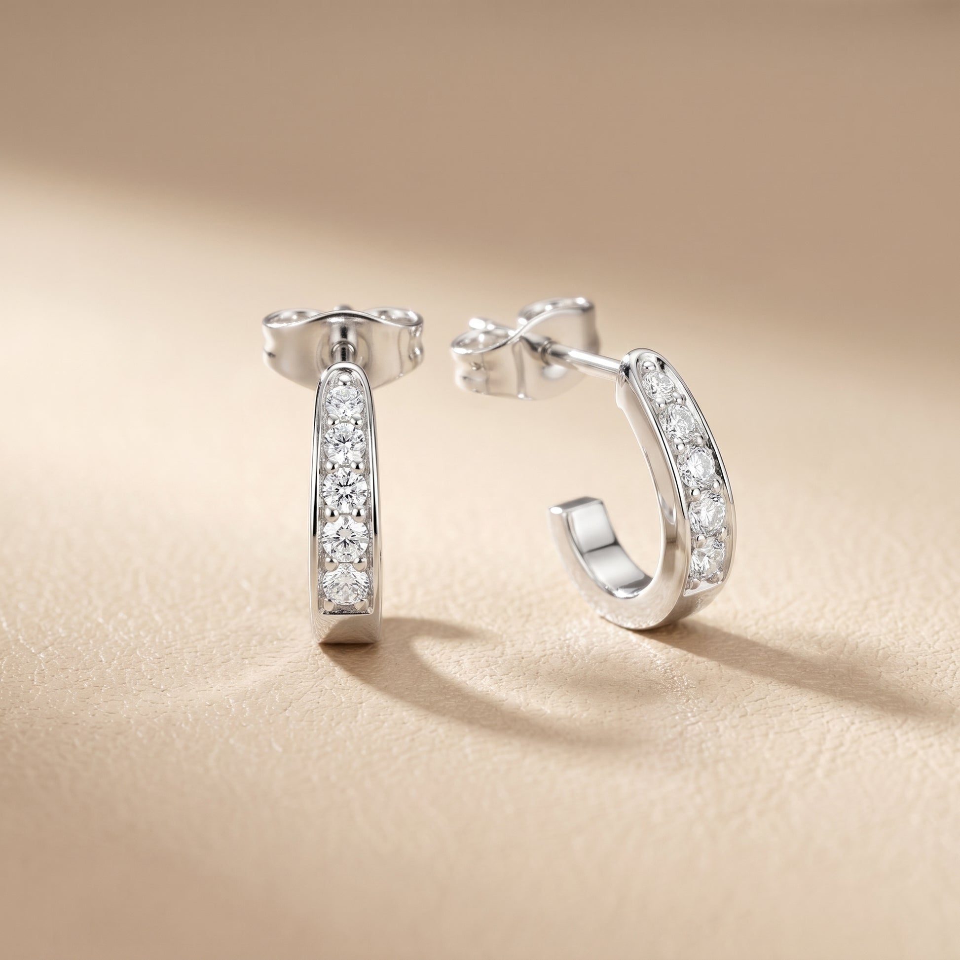 Round Cut Lab Grown Diamond Huggie Earrings in Platinum
