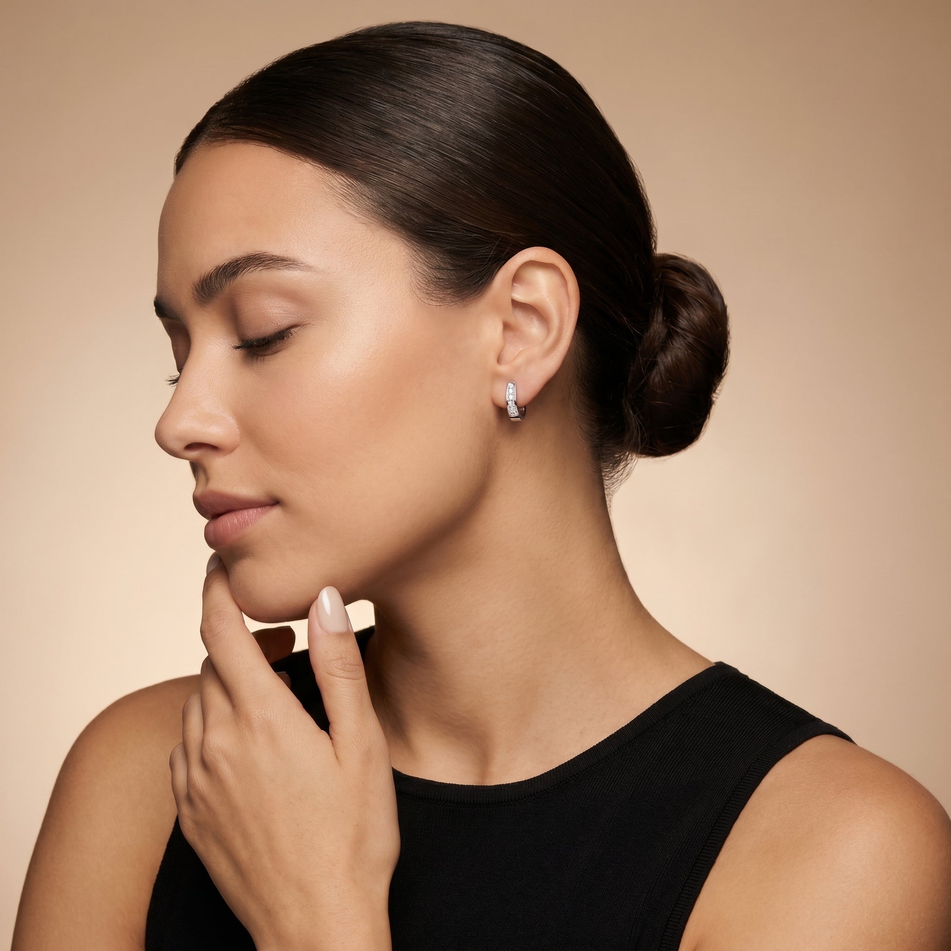 Round Cut Lab Grown Diamond Huggie Earrings in White Gold