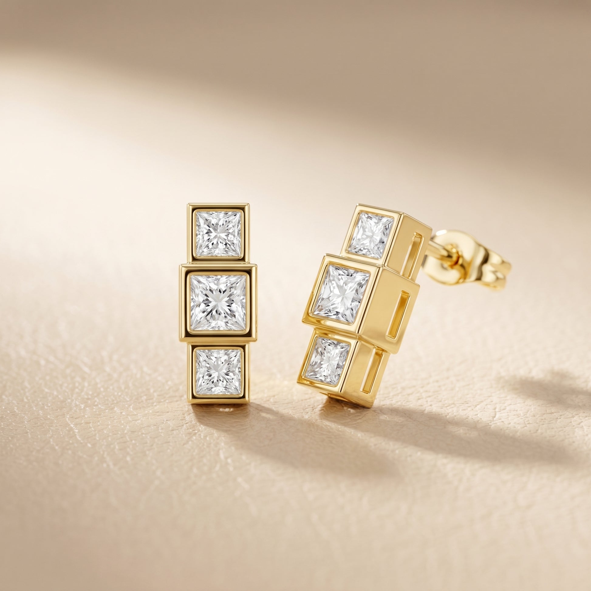 Crest Three-Stone Princess Cut Lab Grown Diamond Stud Earrings in Yellow Gold