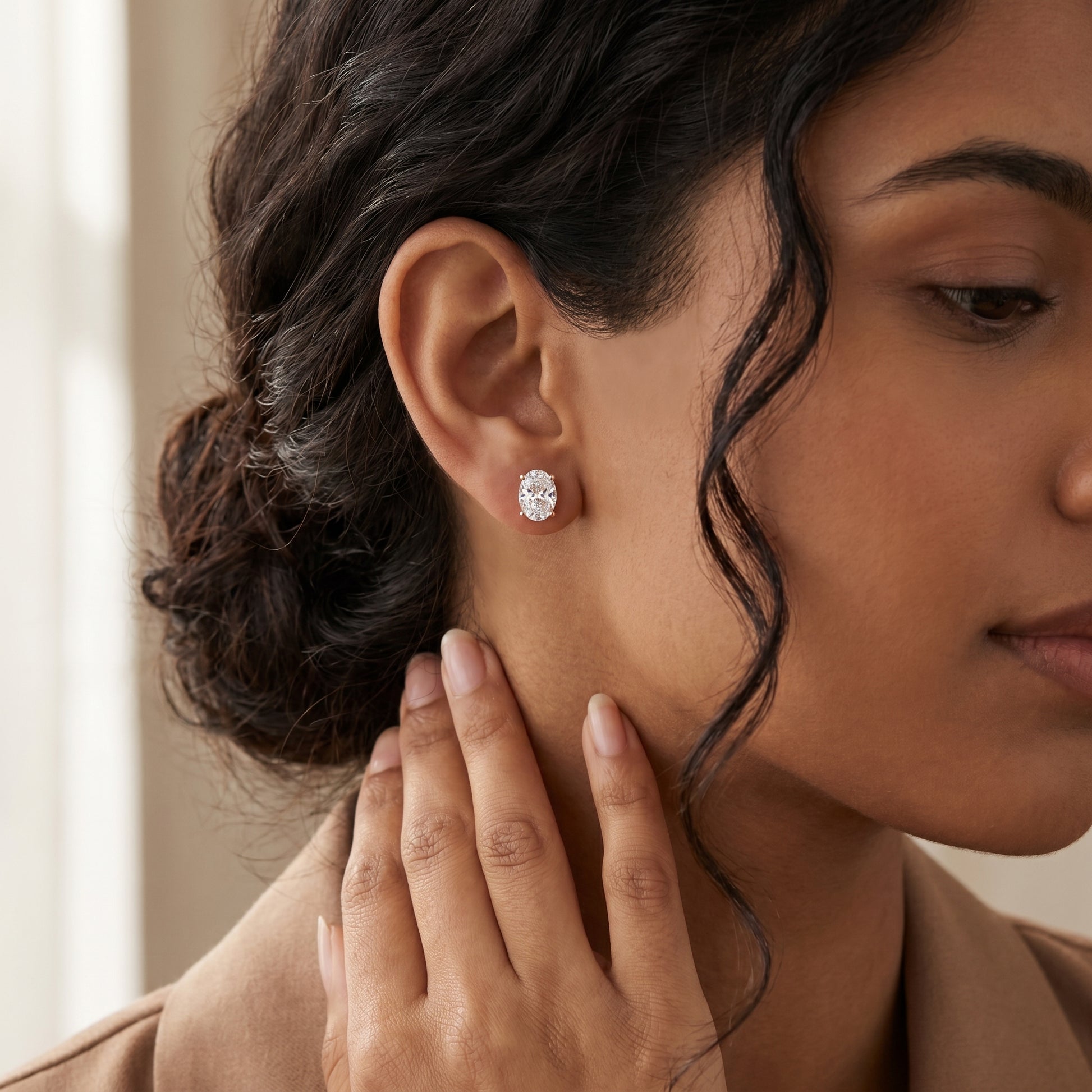 Oval Cut Lab Grown Diamond Stud Earrings in Rose Gold