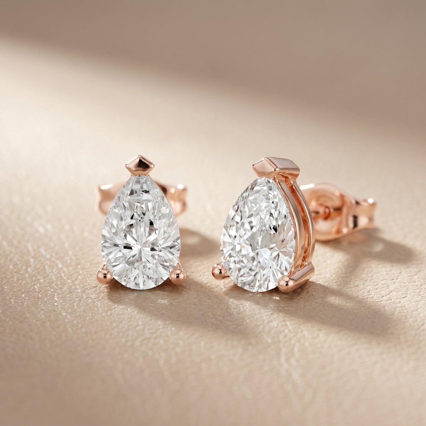 Pear Cut Lab Grown Diamond Stud Earrings in Rose Gold