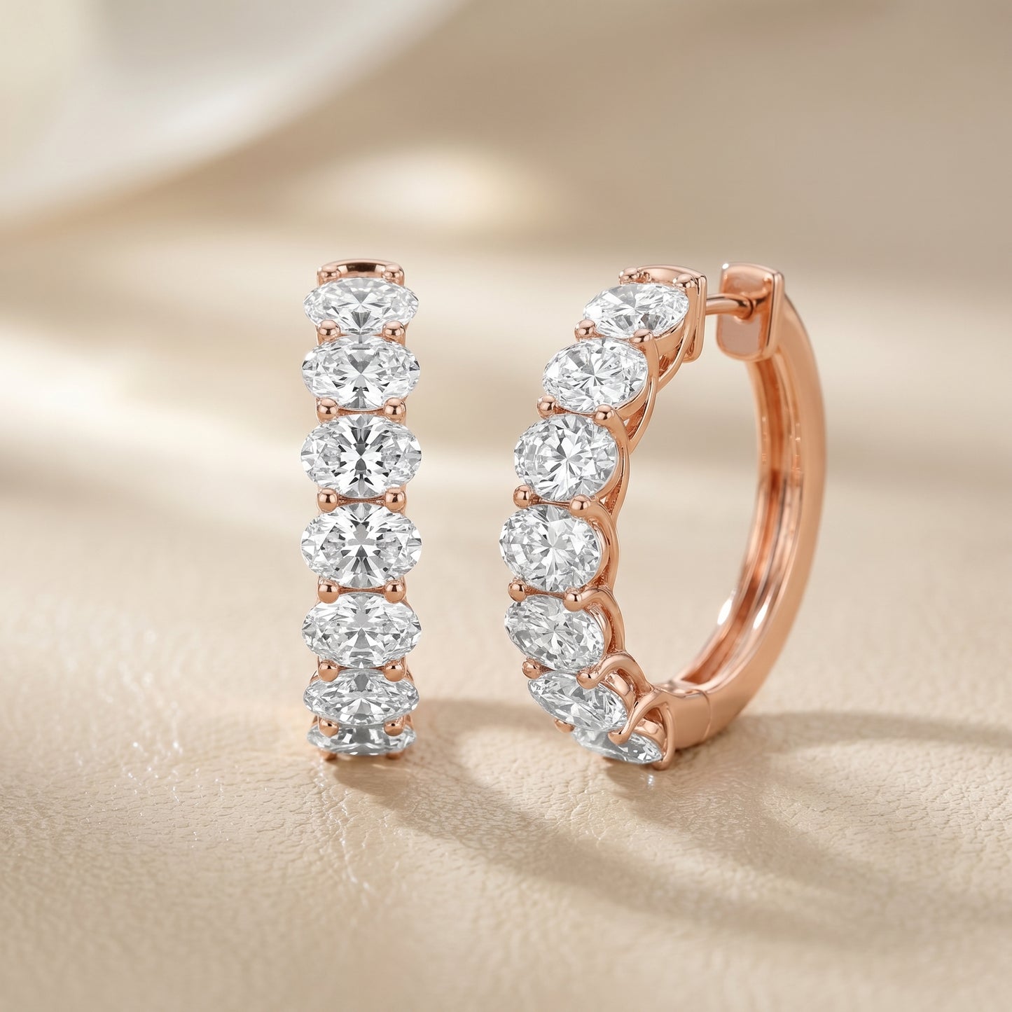 Oval Cut Lab Grown Diamond Hoop Earrings in Rose Gold
