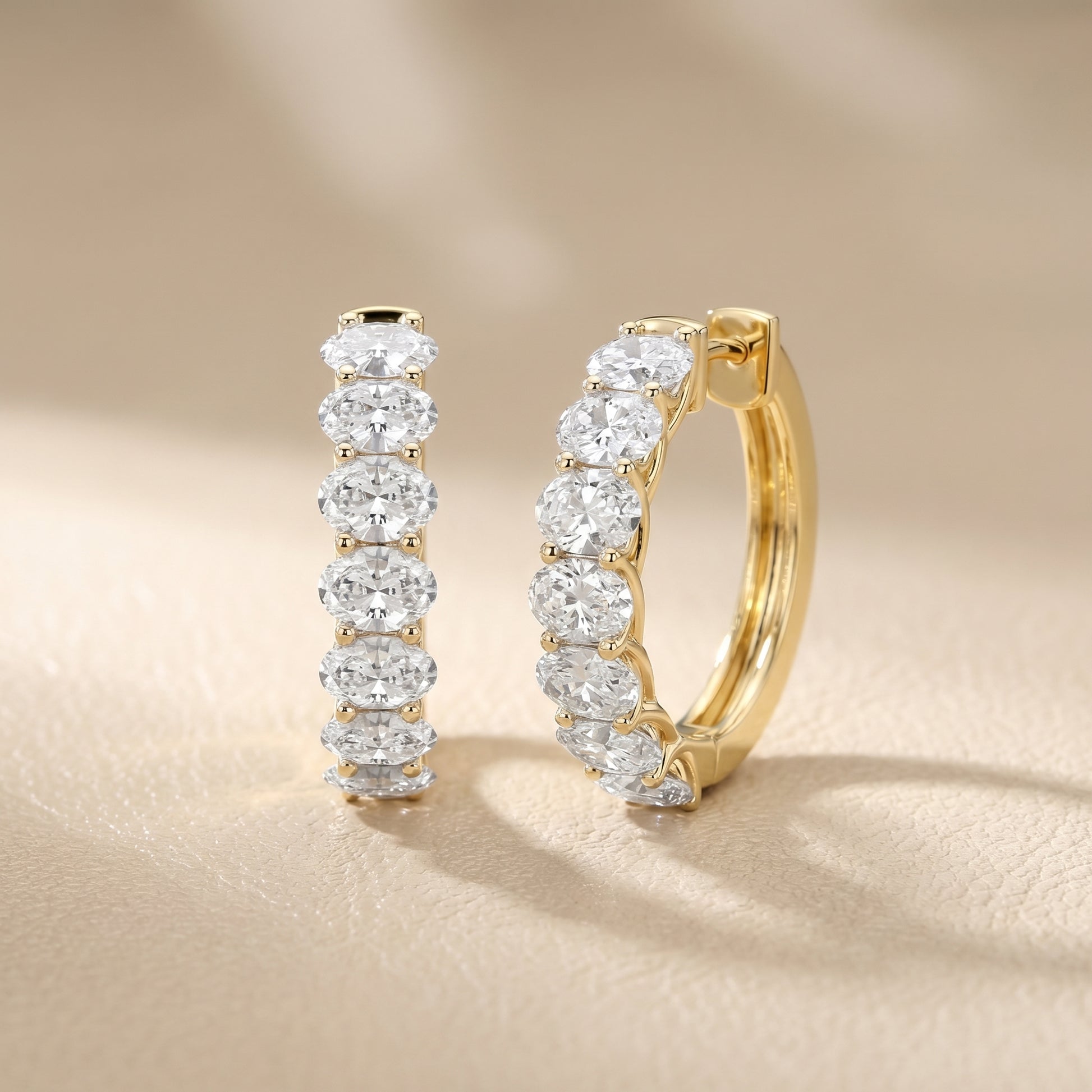 Oval Cut Lab Grown Diamond Hoop Earrings in Yellow Gold