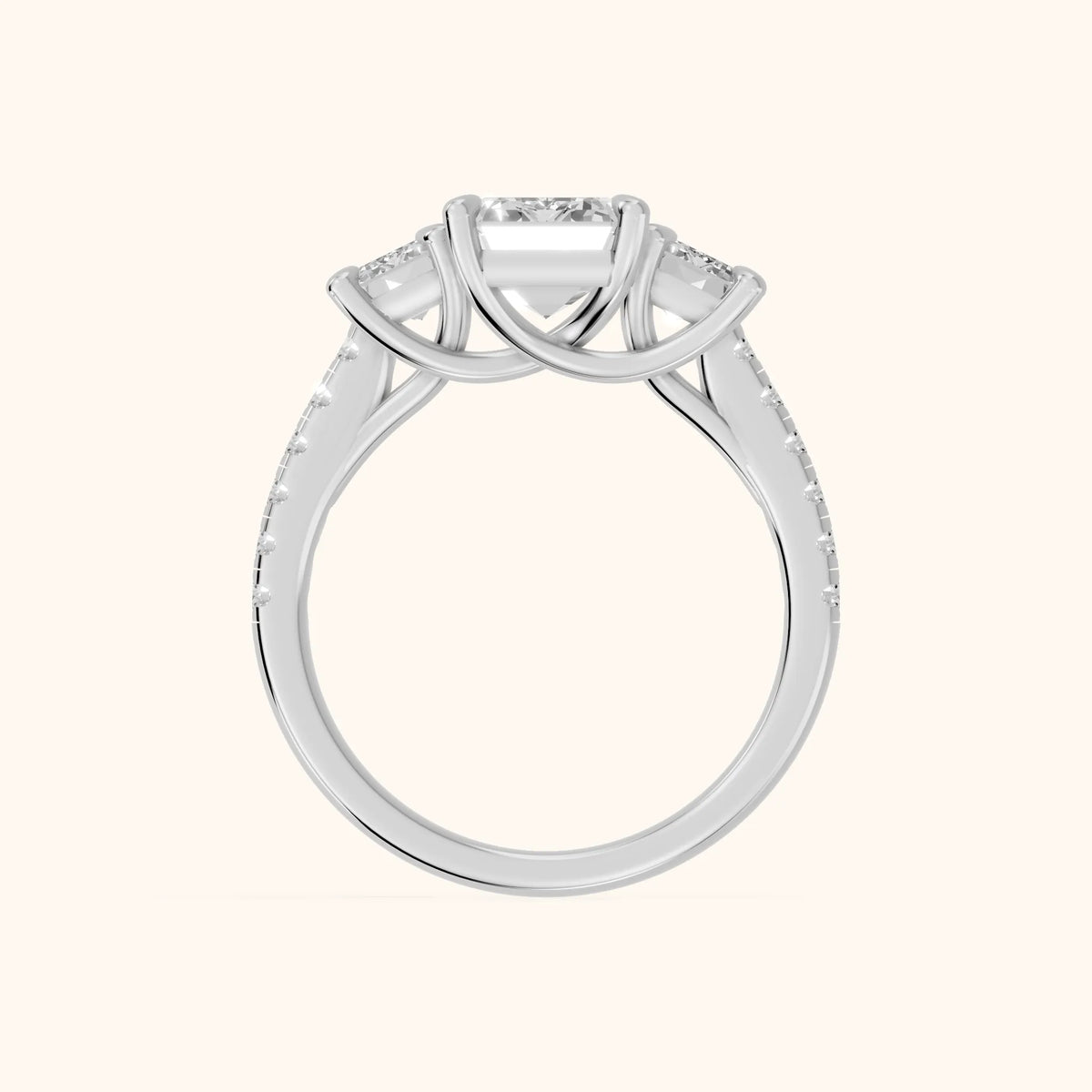 Gabrielle Three-Stone Pavé Emerald Diamond Engagement Ring in Platinum - FingerView.webp