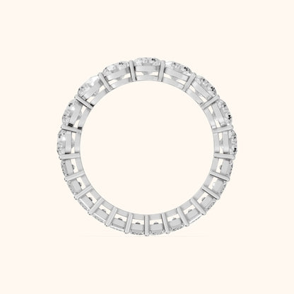 Malia Shared Prong Round & Emerald Diamond Eternity Band in Platinum - FingerView