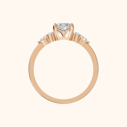 Amelia Three Stone Emerald Diamond Engagement Ring in Rose Gold - FingerView