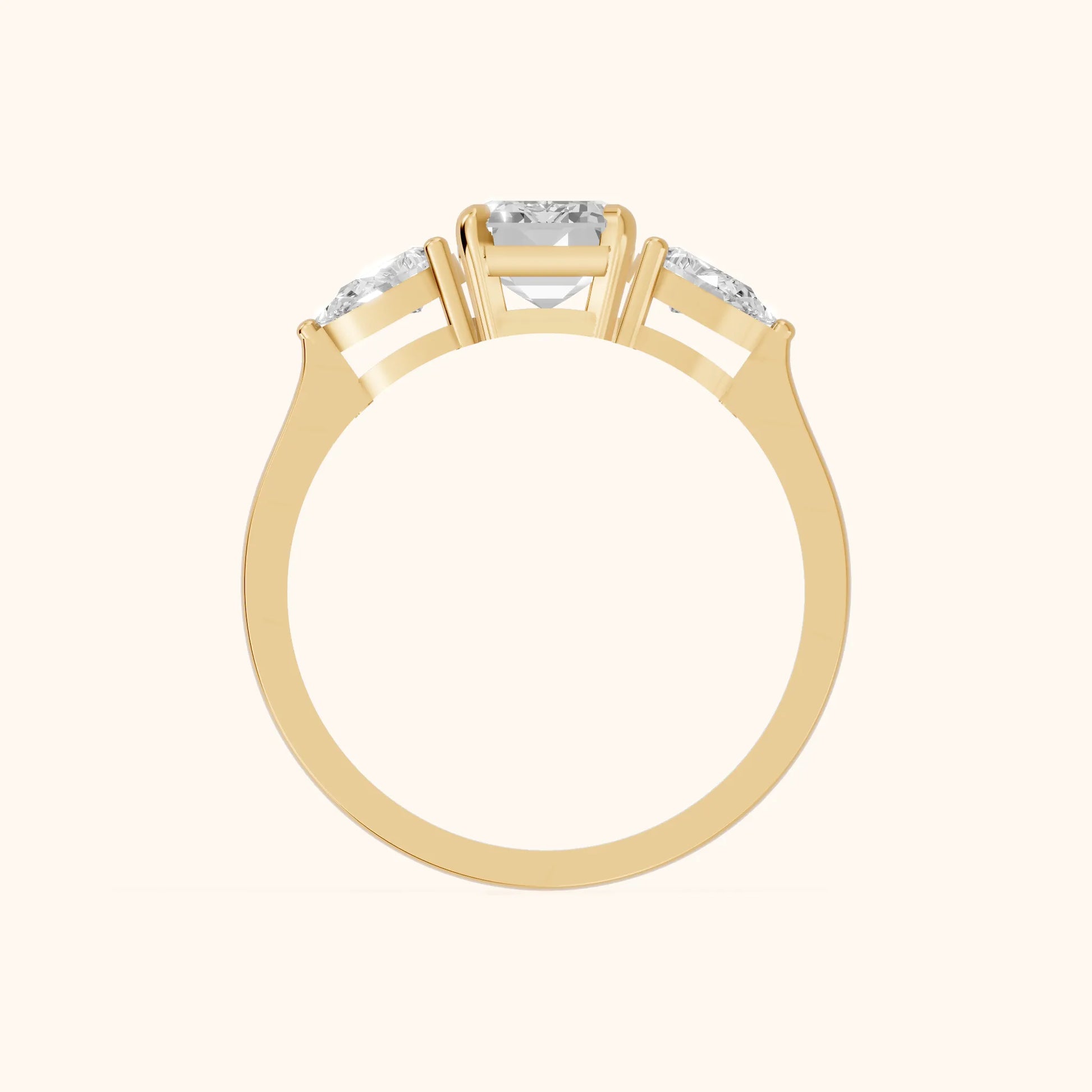Grace Three Stone Emerald Diamond Engagement Ring in Yellow Gold - FingerView