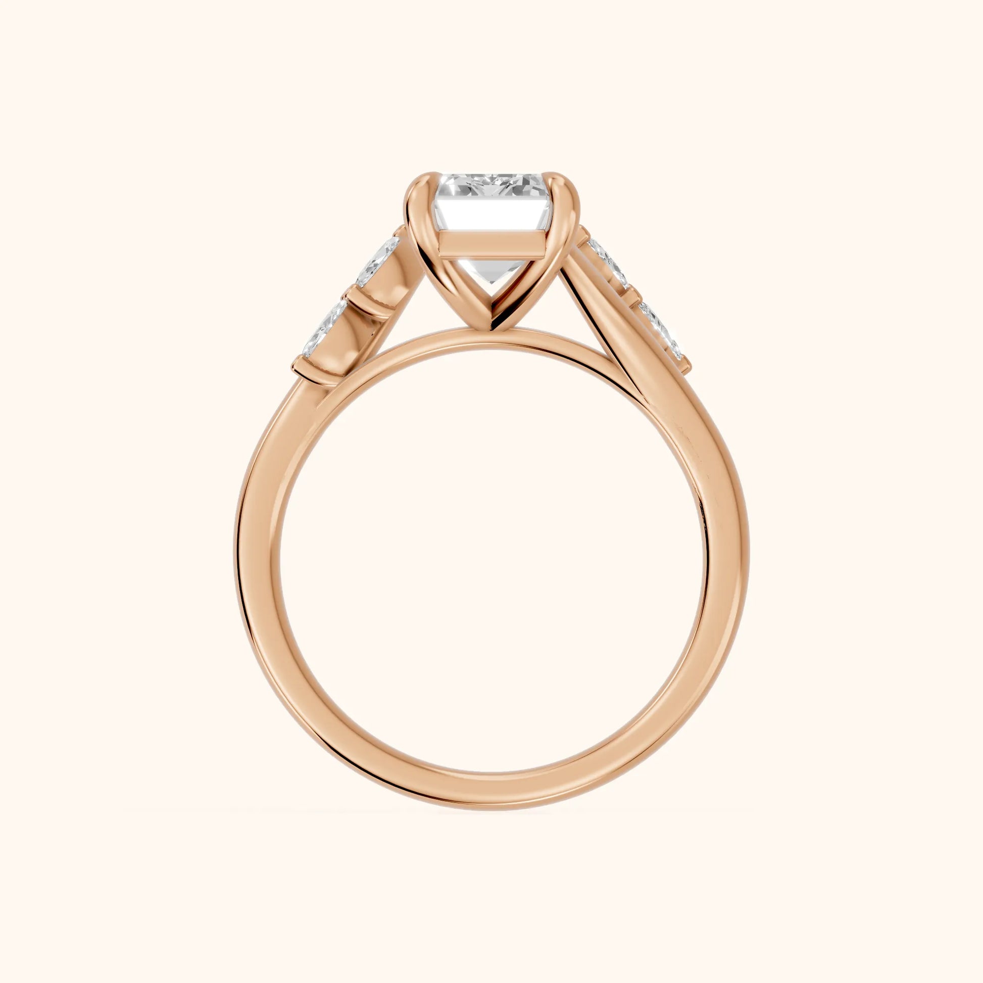 Flora Twist Side Stone Emerald Diamond Engagement Ring in Rose Gold - FingerView
